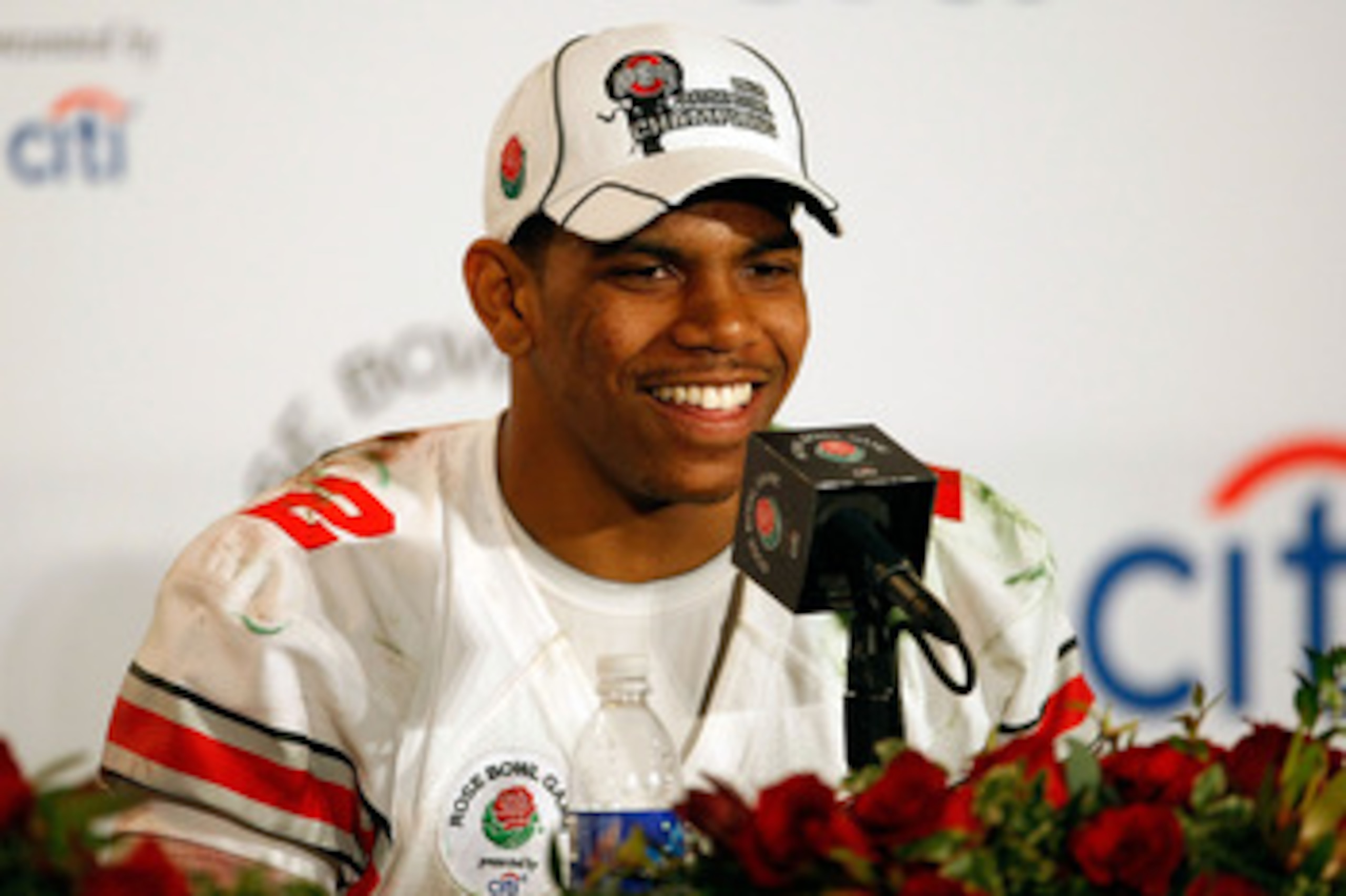 PASADENA, CA - JANUARY 01:  Quarterback Terrelle Pryor #2 of the Ohio State Buckeyes speaks during the post-game news conference after the buckeyes 26-17 win in the 96th Rose Bowl game over the Oregon Ducks on January 1, 2010 in Pasadena, California.  (Ph