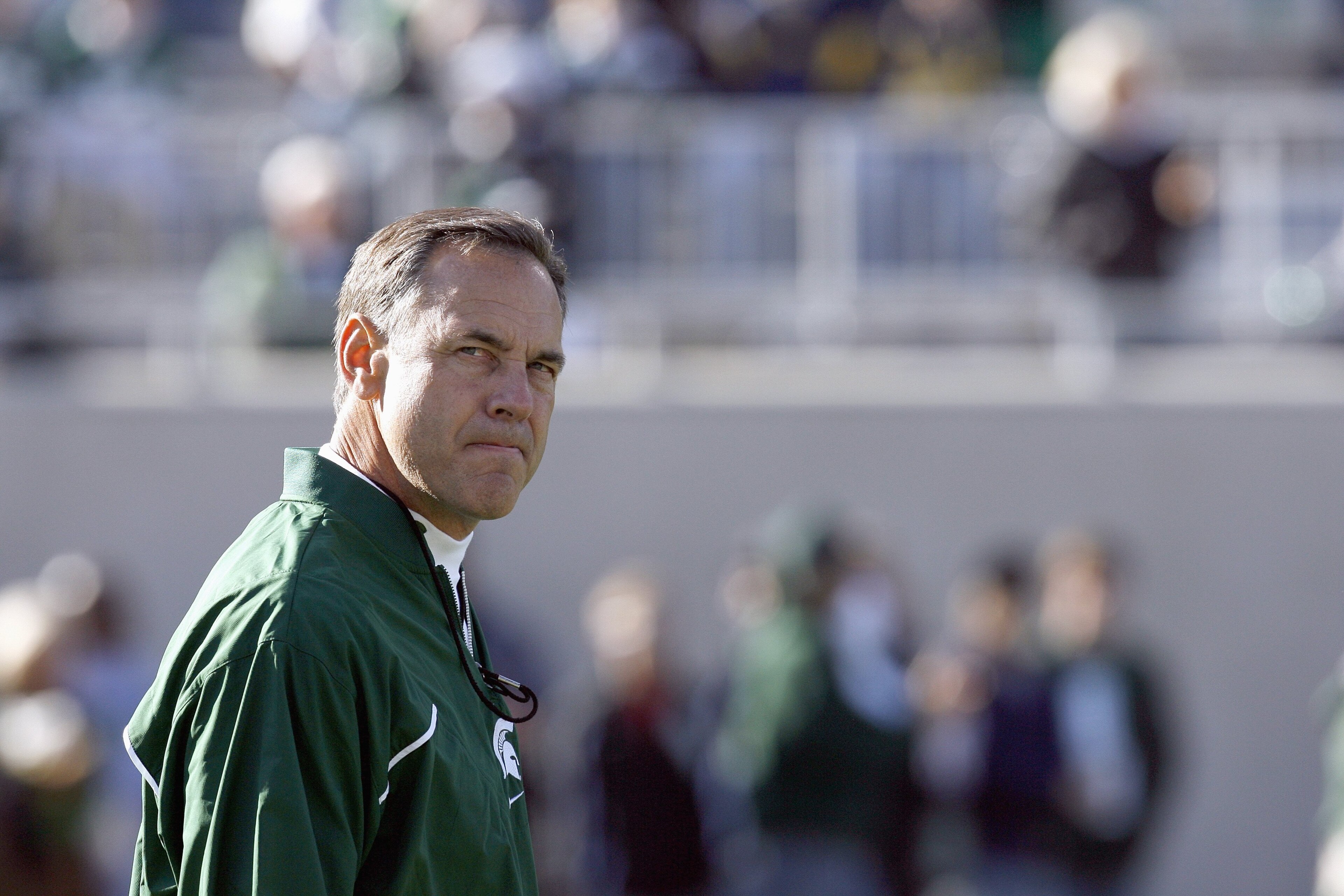 EAST LANSING, MI - NOVEMBER 03: Mark Dantonio of the Michigan State Spartans looks on the field before the game against the Michigan Wolverines at Spartan Stadium November 3, 2007 in East Lansing, Michigan. Michigan defeated Michigan State 28-24. (Photo b EAST LANSING, MI - NOVEMBER 03: Mark Dantonio of the Michigan State Spartans looks on the field before the game against the Michigan Wolverines at Spartan Stadium November 3, 2007 in East Lansing, Michigan. Michigan defeated Michigan State 28-24. (Photo b