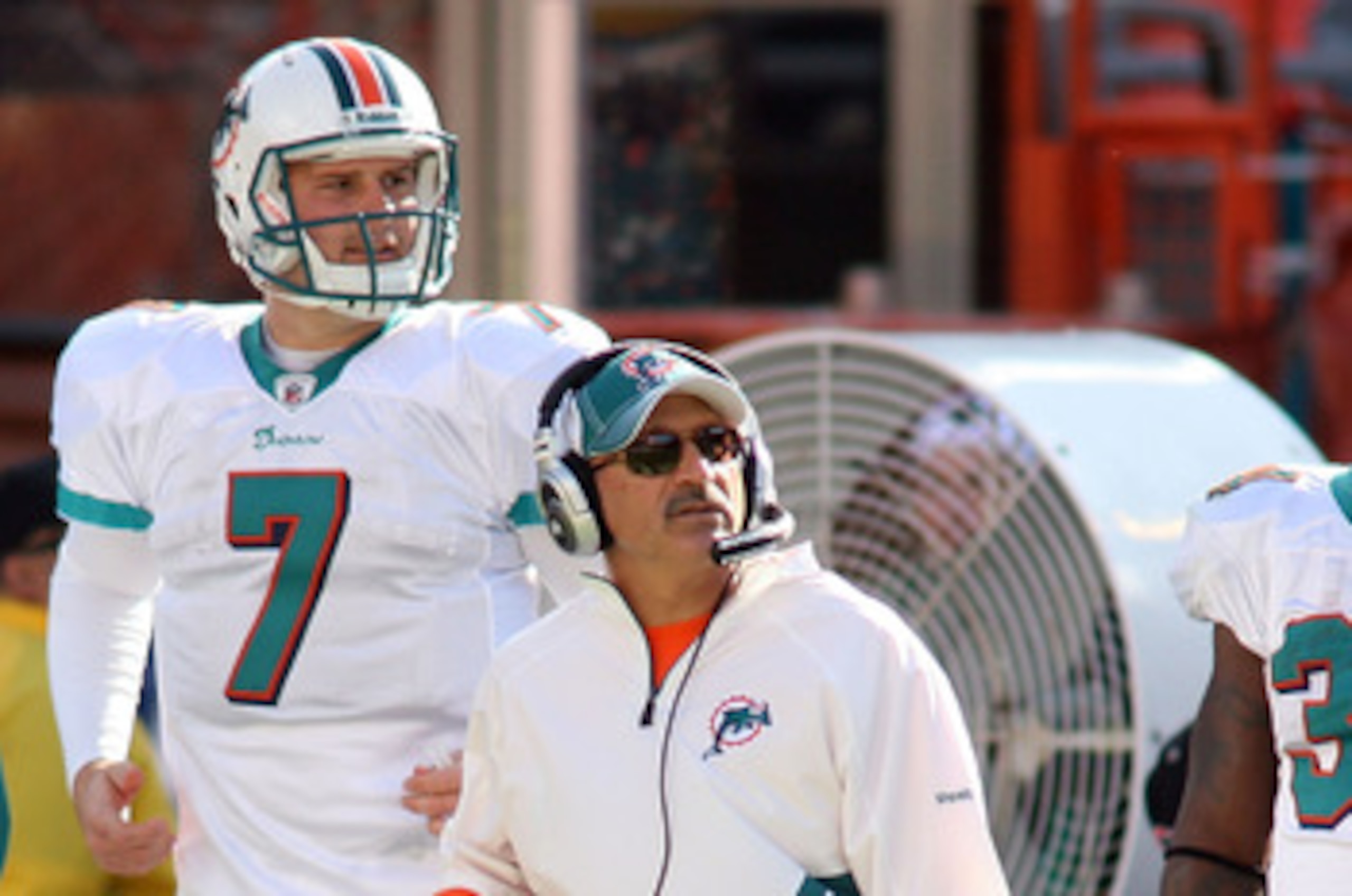 MIAMI - DECEMBER 26: (L-R) Quarterback Chad Henne #7, coach Tony Sparano and running back Ricky Williams #34 of the Miami Dolphins look on from the sidelines against the Detroit Lions at Sun Life Stadium on December 26, 2010 in Miami, Florida.  (Photo by 