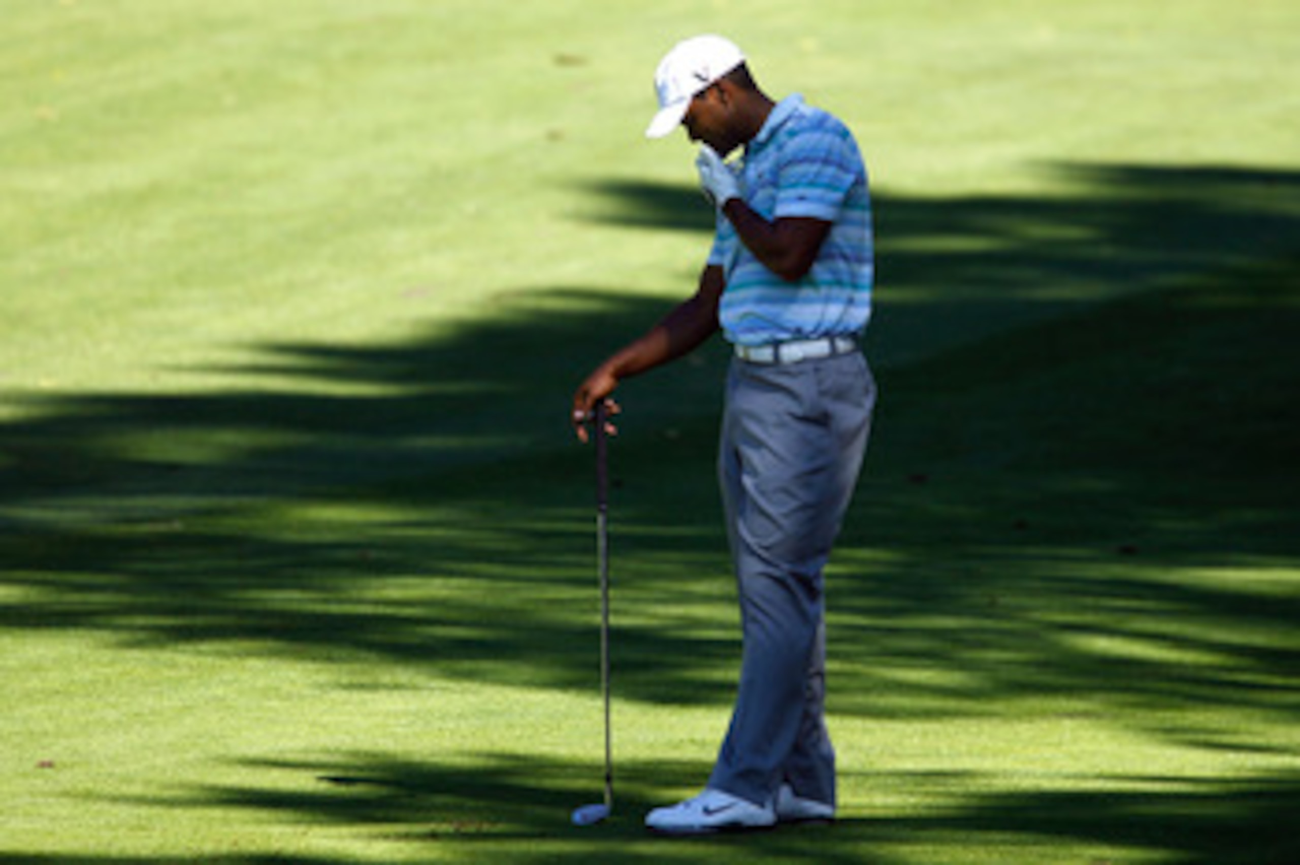 PARAMUS, NJ - AUGUST 27:  Tiger Woods hangs his head as he reacts to his shot from the fairway on the sixth hole during the second round of The Barclays at the Ridgewood Country Club on August 27, 2010 in Paramus, New Jersey.  (Photo by Scott Halleran/Get