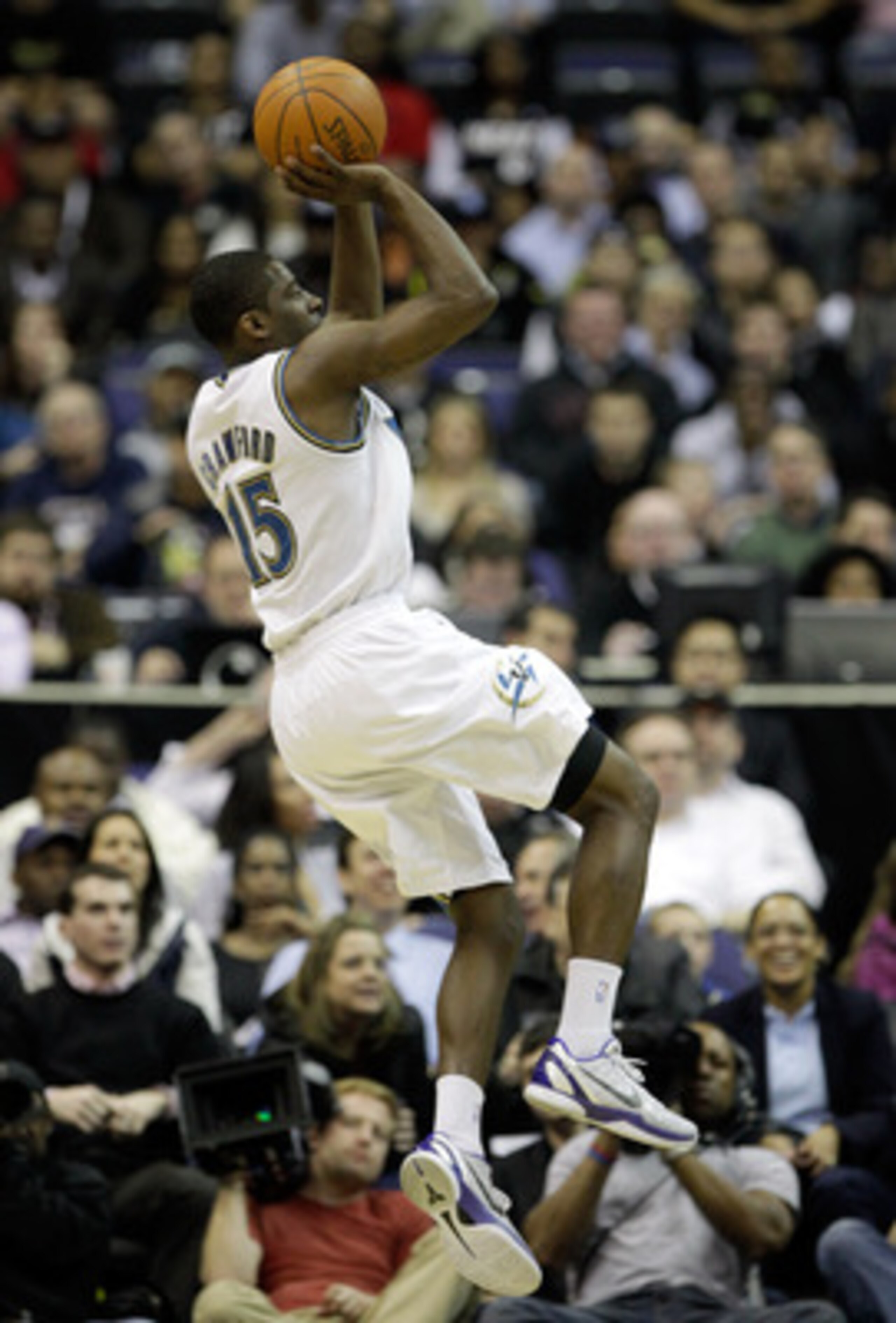 WASHINGTON, DC - MARCH 30: Jordan Crawford #15 of the Washington Wizards puts up a shot against the Miami Heat at the Verizon Center on March 30, 2011 in Washington, DC. NOTE TO USER: User expressly acknowledges and agrees that, by downloading and/or usin