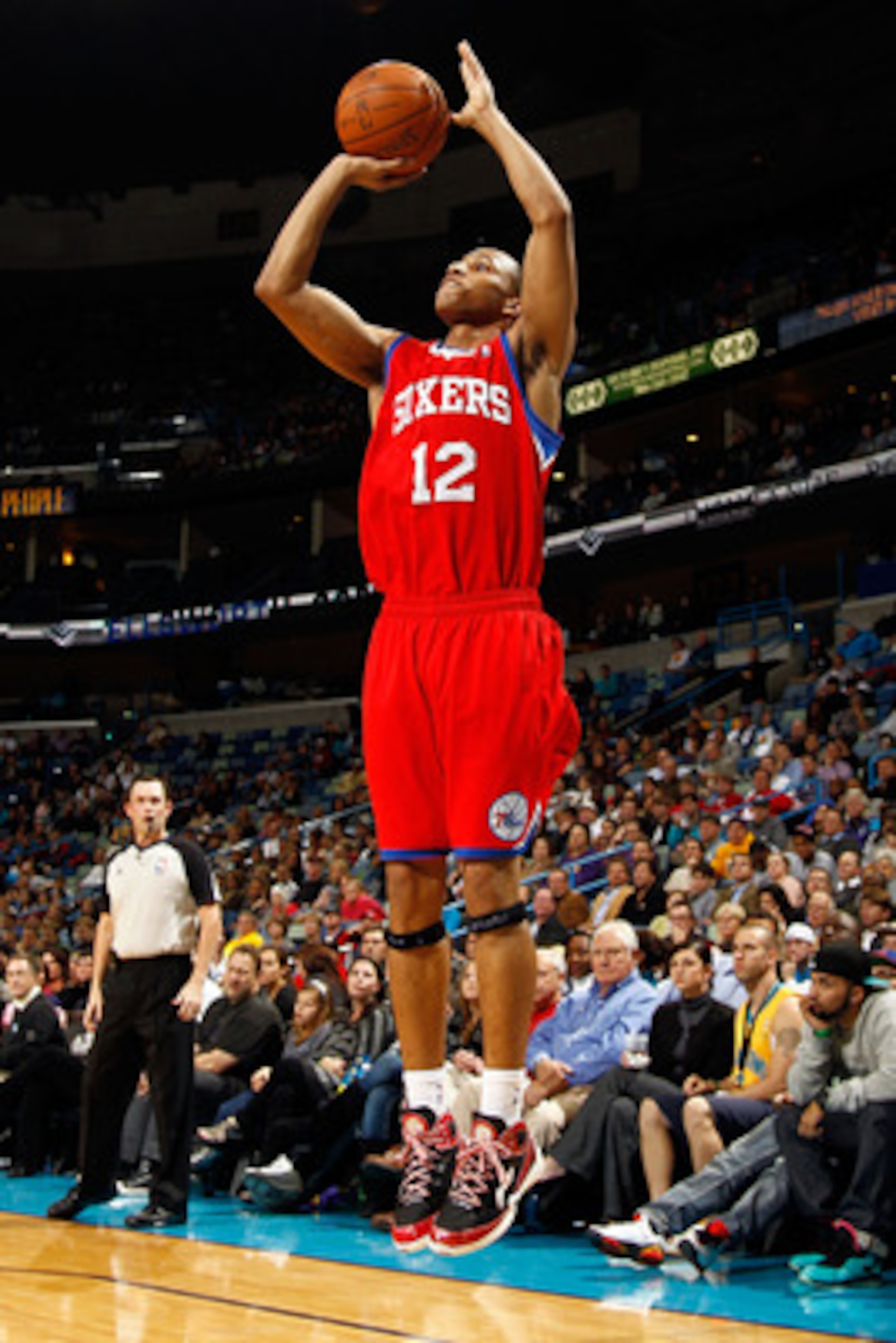 NEW ORLEANS, LA - JANUARY 03:  Evan Turner #12 of the Philadelphia 76ers shoots a jumper against the New Orleans Hornets at New Orleans Arena on January 3, 2011 in New Orleans, Louisiana. NOTE TO USER: User expressly acknowledges and agrees that, by downl