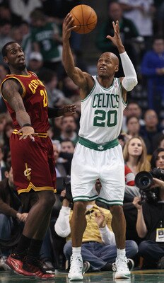 BOSTON, MA - JANUARY 25:  Ray Allen #20 of the Boston Celtics nabs the rebound before Samardo Samuels #24  of the of the Cleveland Cavaliers on January 25, 2011 at the TD Garden in Boston, Massachusetts. The Celtics defeated the Cavaliers 112-95.  NOTE TO