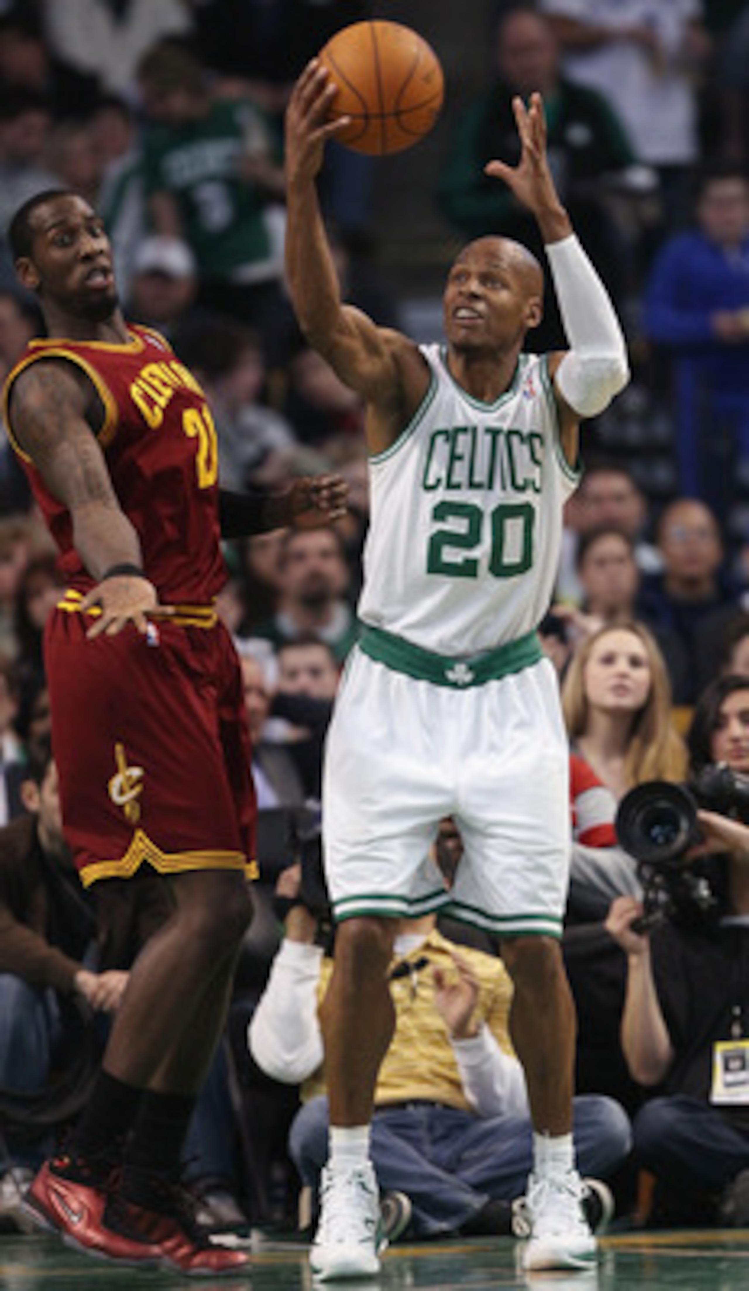 BOSTON, MA - JANUARY 25:  Ray Allen #20 of the Boston Celtics nabs the rebound before Samardo Samuels #24  of the of the Cleveland Cavaliers on January 25, 2011 at the TD Garden in Boston, Massachusetts. The Celtics defeated the Cavaliers 112-95.  NOTE TO