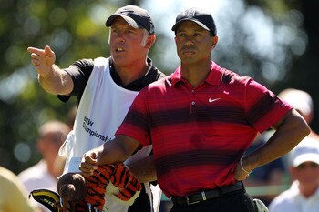 LEMONT, IL - SEPTEMBER 12:  Caddie Steve Williams and Tiger Woods talk over a shot on the sixth hole during the final round of the BMW Championship at Cog Hill Golf & Country Club on September 12, 2010 in Lemont, Illinois.  (Photo by Jamie Squire/Getty Im