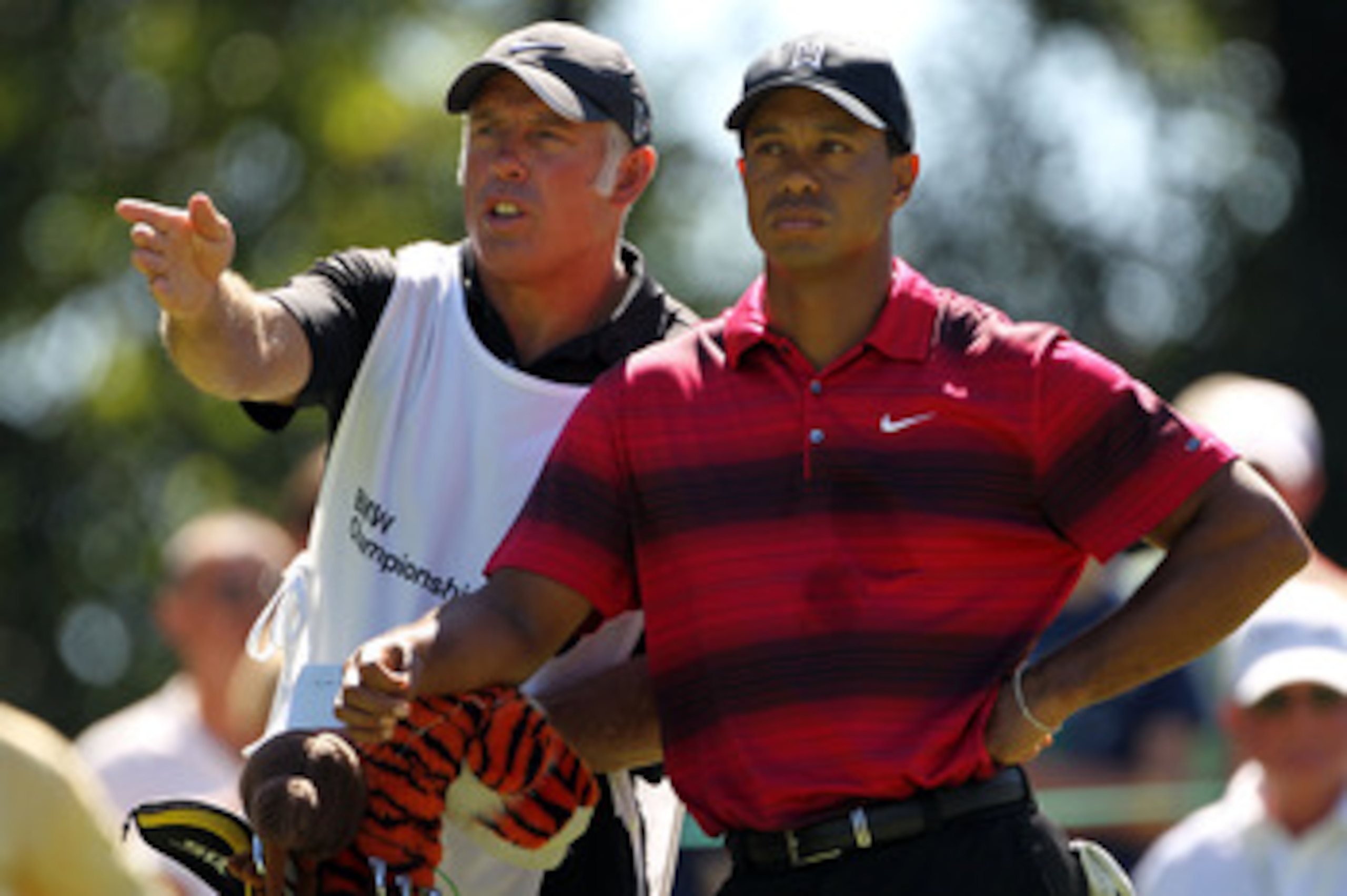 LEMONT, IL - SEPTEMBER 12:  Caddie Steve Williams and Tiger Woods talk over a shot on the sixth hole during the final round of the BMW Championship at Cog Hill Golf & Country Club on September 12, 2010 in Lemont, Illinois.  (Photo by Jamie Squire/Getty Im