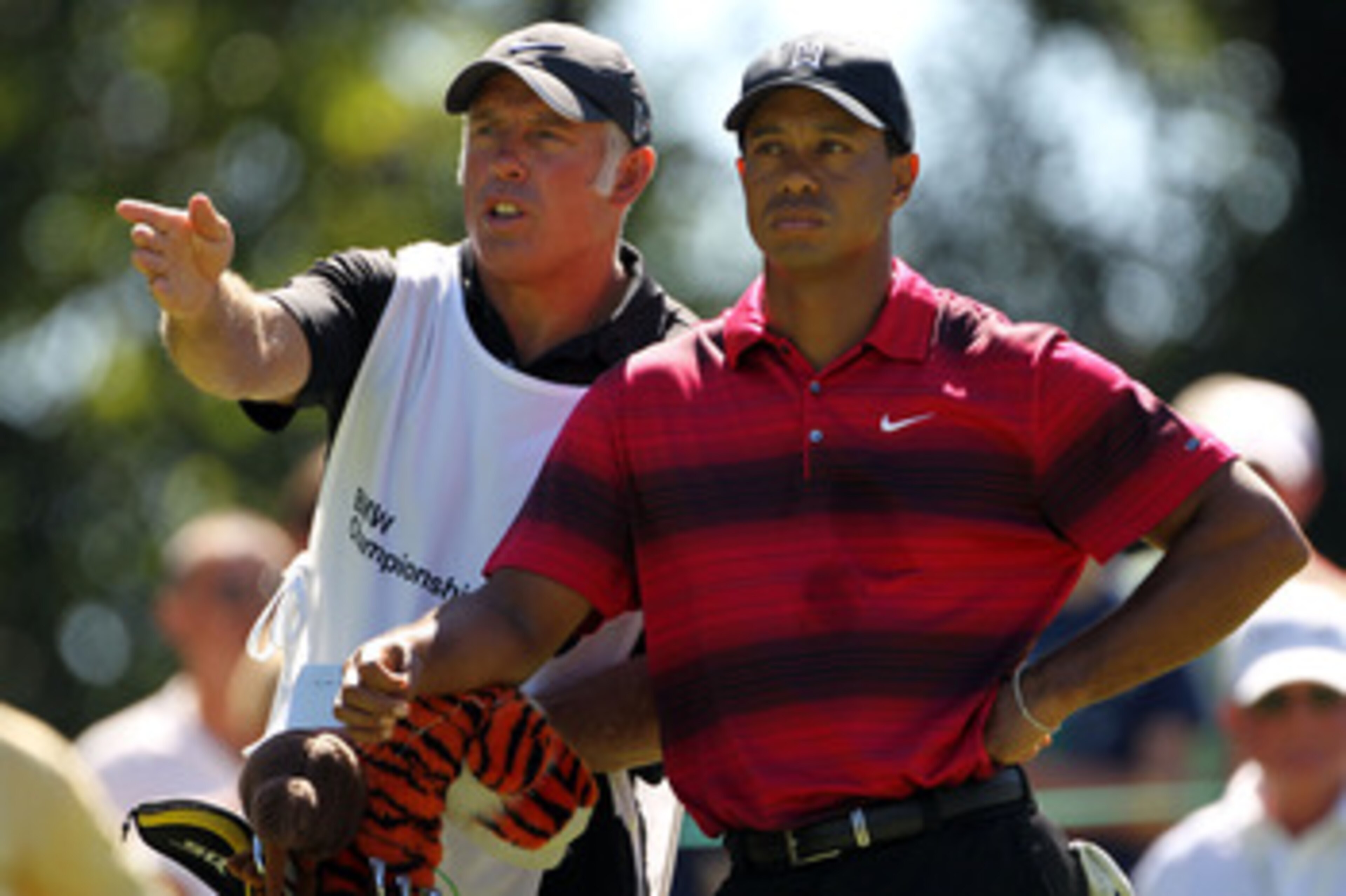 LEMONT, IL - SEPTEMBER 12:  Caddie Steve Williams and Tiger Woods talk over a shot on the sixth hole during the final round of the BMW Championship at Cog Hill Golf & Country Club on September 12, 2010 in Lemont, Illinois.  (Photo by Jamie Squire/Getty Im