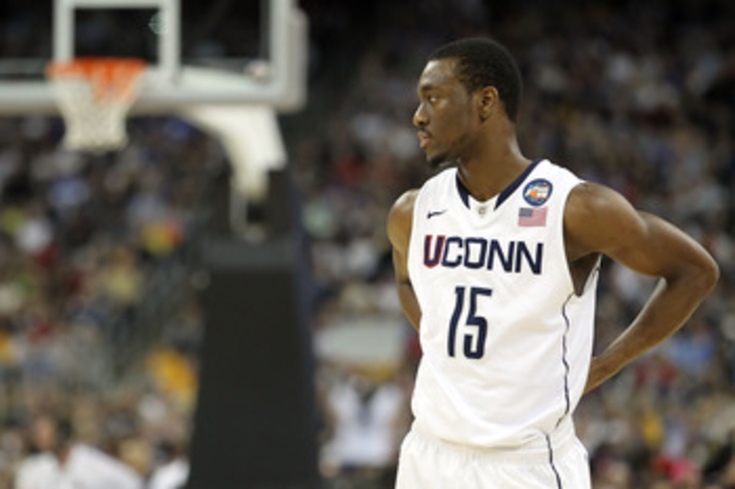 HOUSTON, TX - APRIL 04: Kemba Walker #15 of the Connecticut Huskies looks on against the Butler Bulldogs during the National Championship Game of the 2011 NCAA Division I Men's Basketball Tournament at Reliant Stadium on April 4, 2011 in Houston, Texas. HOUSTON, TX - APRIL 04: Kemba Walker #15 of the Connecticut Huskies looks on against the Butler Bulldogs during the National Championship Game of the 2011 NCAA Division I Men's Basketball Tournament at Reliant Stadium on April 4, 2011 in Houston, Texas.