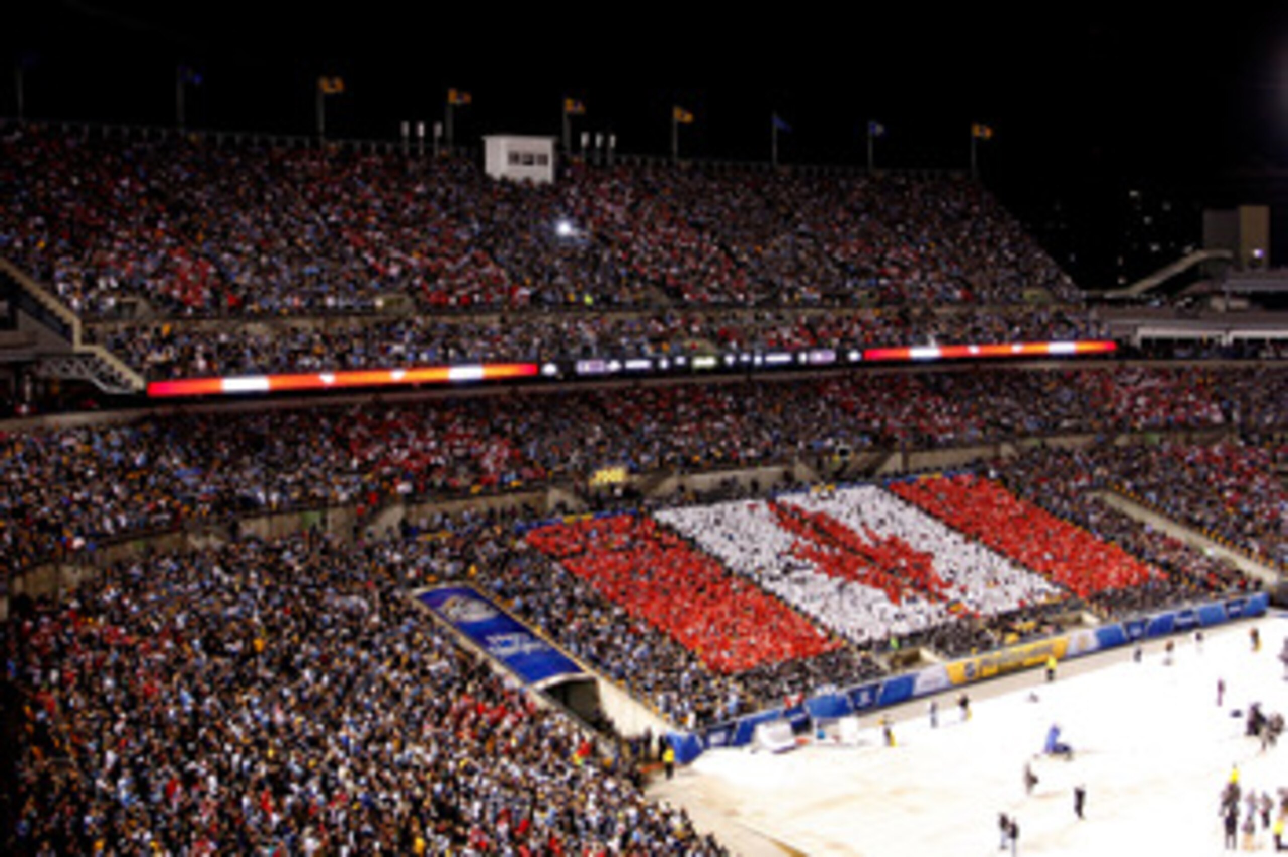 PITTSBURGH, PA - JANUARY 01: A Canadian Flag is seen in the stands during the singing of the Canadian Anthem before the start of the 2011 NHL Bridgestone Winter Classic at Heinz Field on January 1, 2011 in Pittsburgh, Pennsylvania. (Photo by Justin K. A PITTSBURGH, PA - JANUARY 01: A Canadian Flag is seen in the stands during the singing of the Canadian Anthem before the start of the 2011 NHL Bridgestone Winter Classic at Heinz Field on January 1, 2011 in Pittsburgh, Pennsylvania. (Photo by Justin K. A