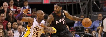 MIAMI, FL - MARCH 10:  LeBron James #6 of the Miami Heat posts up Kobe Bryant #24 of  the Los Angeles Lakers  during a game at American Airlines Arena on March 10, 2011 in Miami, Florida. NOTE TO USER: User expressly acknowledges and agrees that, by downl