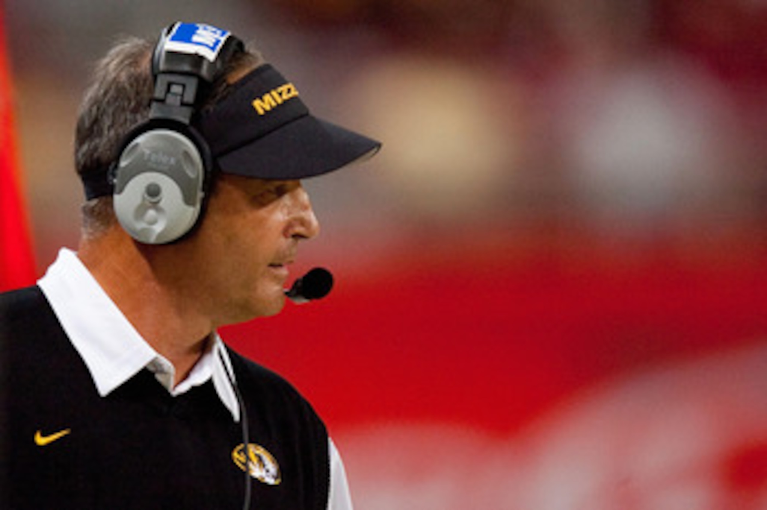 ST. LOUIS - SEPTEMBER 4: Head coach Gary Pinkel of the University of Missouri Tigers looks on from the sideline against the University of Illinois Fighting Illini during the State Farm Arch Rivalry game on September 4, 2010 at the Edward Jones Dome in St. ST. LOUIS - SEPTEMBER 4: Head coach Gary Pinkel of the University of Missouri Tigers looks on from the sideline against the University of Illinois Fighting Illini during the State Farm Arch Rivalry game on September 4, 2010 at the Edward Jones Dome in St.