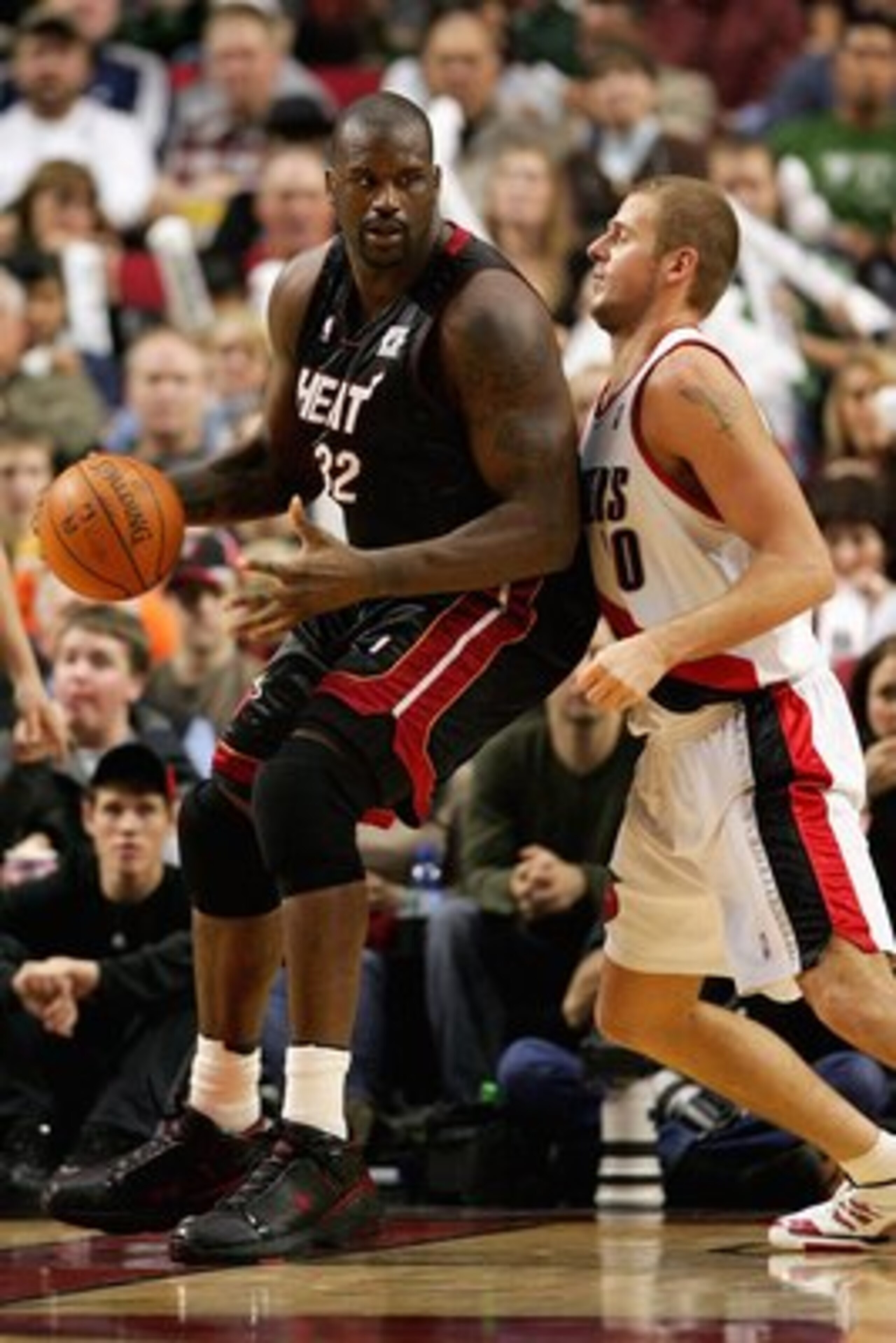 PORTLAND, OR - DECEMBER 6:  Shaquille O'Neal #32 of the Miami Heat goes up against Joel Przybilla #10 of the Portland Trail Blazers during the game on December 6, 2007 at the Rose Garden in Portland, Oregon.  The Blazers won 112-106.  NOTE TO USER: User e