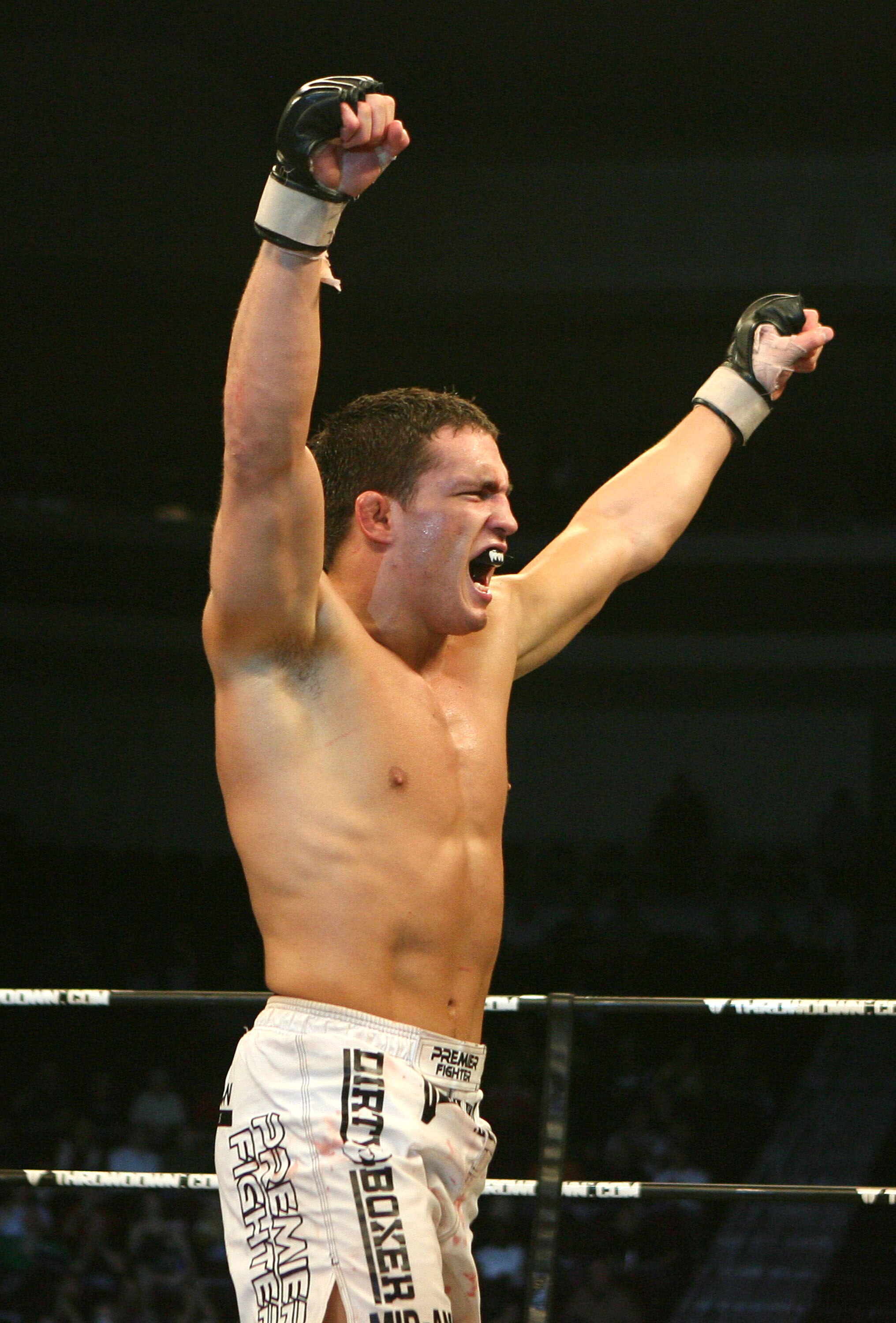 LAS VEGAS - FEBRUARY 29:  Jake Ellenberger white trunks black lettering of Team Quest celebrates his victory over Pat Healy white trunks of Lion's Den during their welterweight bout at The Orleans Arena on February 29, 2008 in Las Vegas, Nevada.  (Photo b