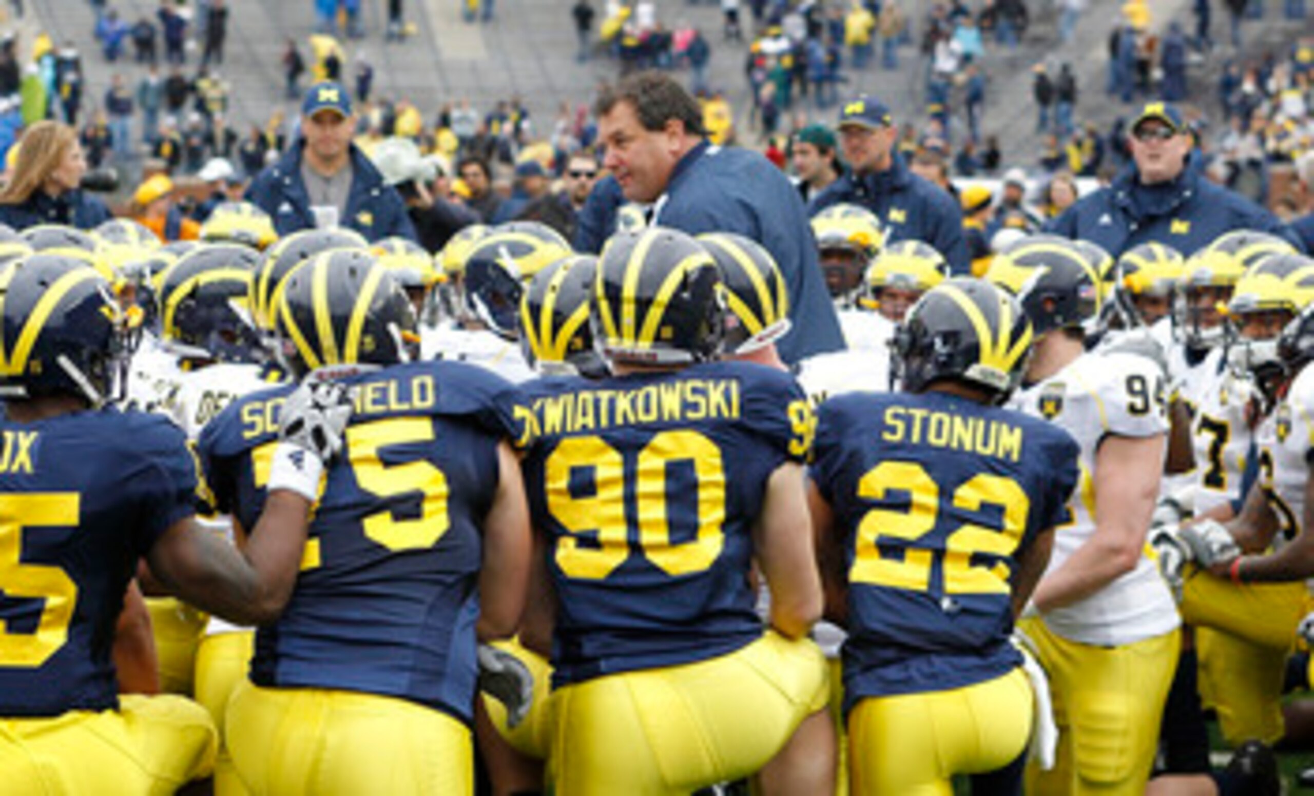 ANN ARBOR, MI - APRIL 16:  Head football coach Brady Hoke talks with his team during the annual Spring Game at Michigan Stadium on April 16, 2011 in Ann Arbor, Michigan.  (Photo by Leon Halip/Getty Images)
