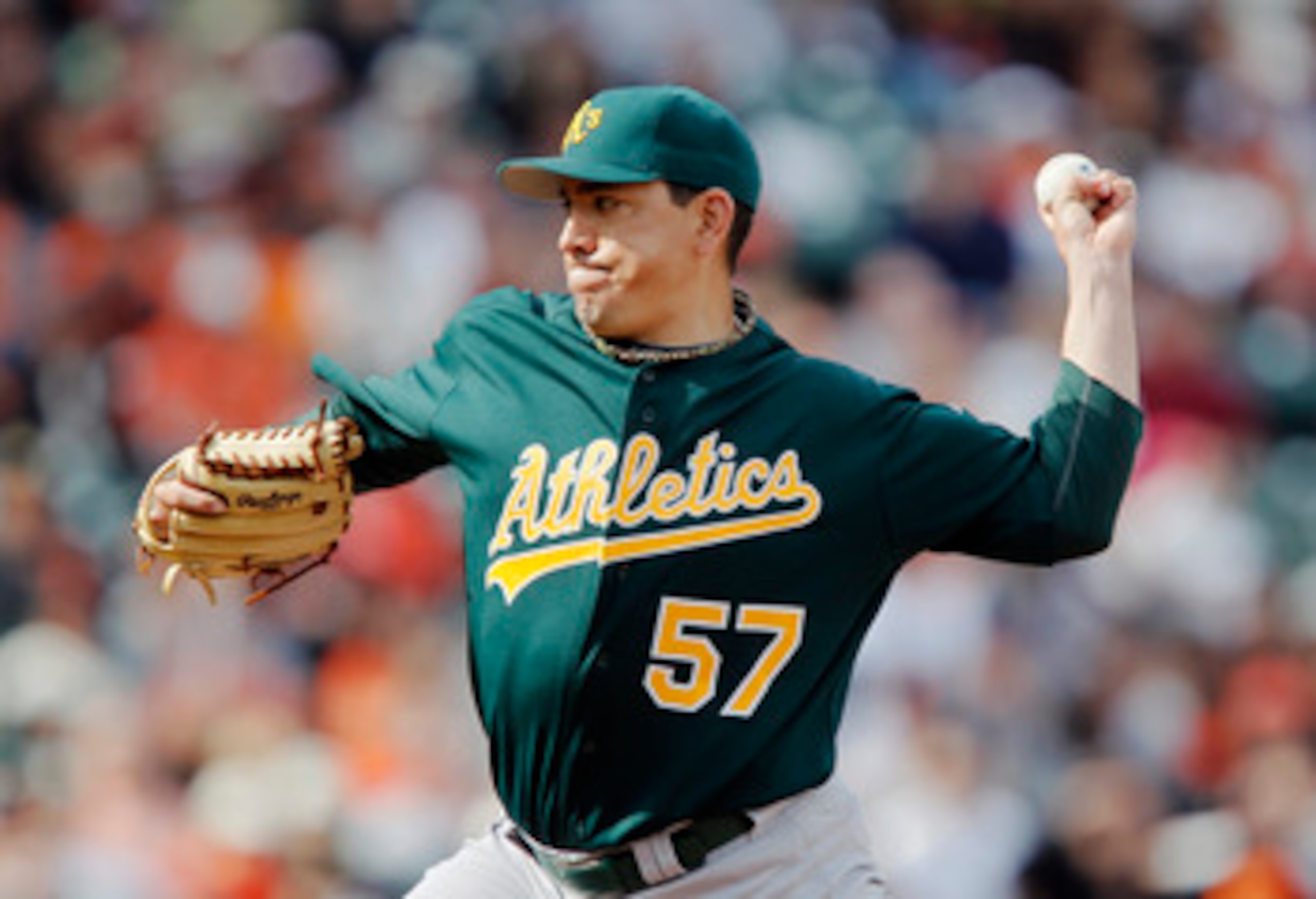 SAN FRANCISCO, CA - MAY 22:  Brian Fuentes #57 of the Oakland A's throws against the San Francisco Giants at AT&T Park on May 22, 2011 in San Francisco, California.  The Giants won 5-4.  (Photo by Brian Bahr/Getty Images)