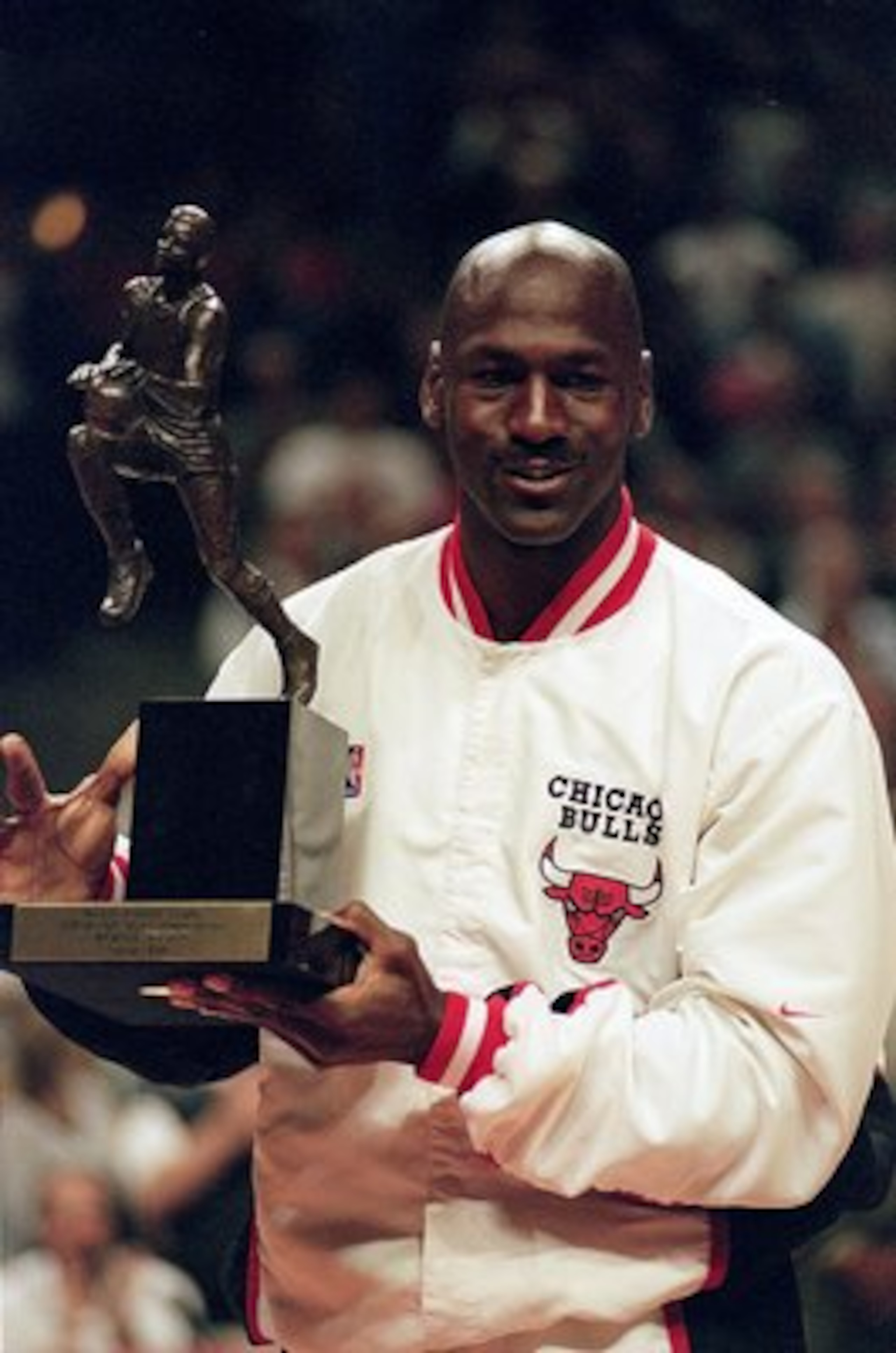 12 Jun 1998:  Michael Jordan #23 of the Chicago Bulls holds up the MVP trophy before the Eastern Conference game against the Indiana Pacers at the United Center in Chicago, Illinois. The Bulls defeated the Pacers 104-98. .  Mandatory Credit: Jonathan Dani
