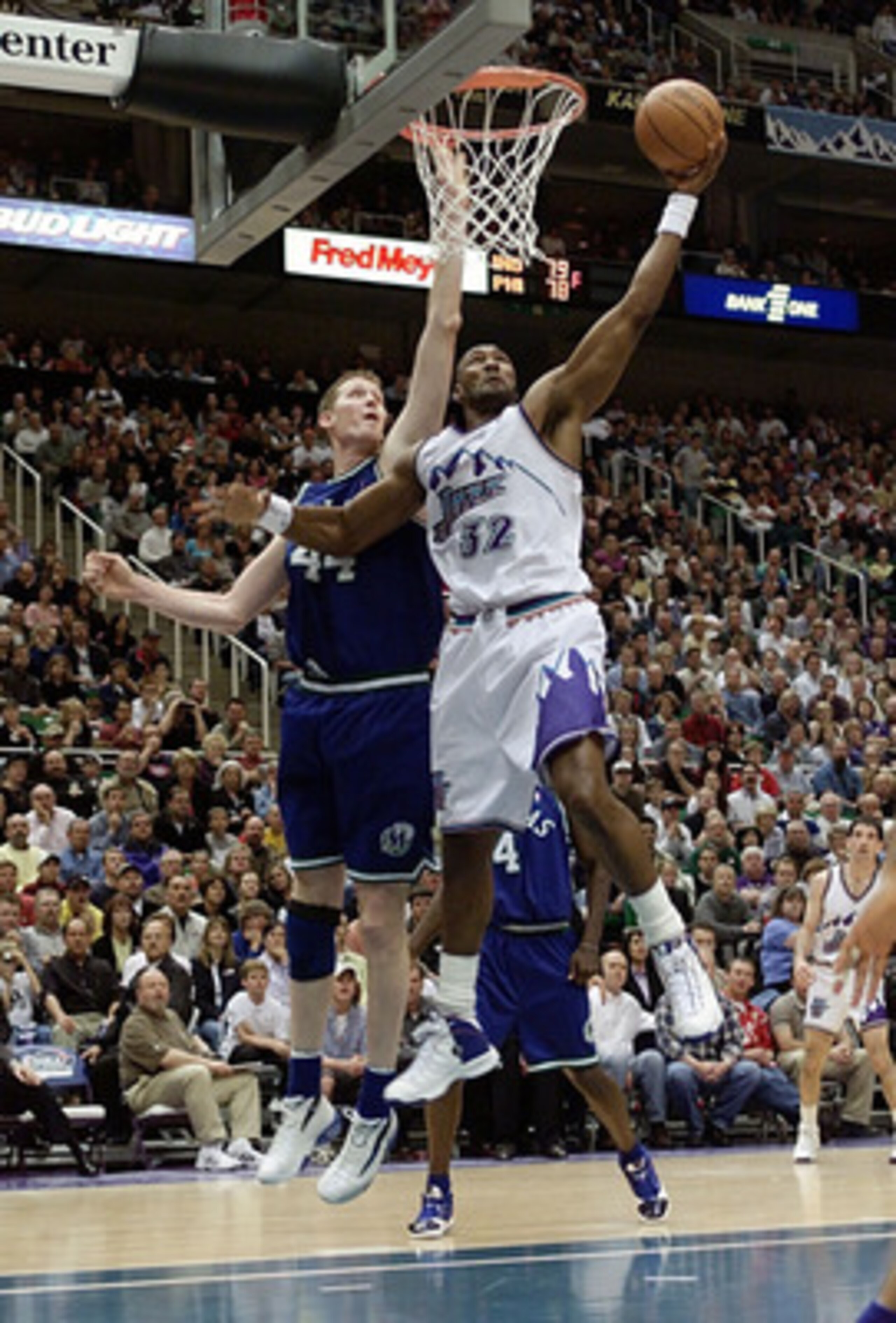 21 Apr 2001:  Forward Karl Malone #32 of the Utah Jazz works around center Shawn Bradley #44 of the Dallas Mavericks during their first round playoff game at the Delta Center in Salt Lake City, Utah.  <DIGITAL IMAGE> Mandatory Credit: Brian Bahr/ALLSPORT