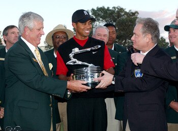 UNITED STATES - JANUARY 23:  Tiger Woods receives the Winner's Trophy on the 18th Green after winning the 2005 Buick Open at Torrey Pines Golf Course in La Jolla, California January 23, 2005.  (Photo by Steve Grayson/Getty Images)