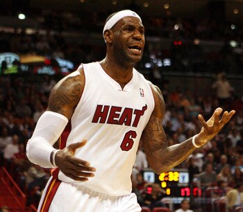 MIAMI - NOVEMBER 13:  Forward LeBron James #6 of the Miami Heat complains  against the Toronto Raptors at American Airlines Arena on November 13, 2010 in Miami, Florida. NOTE TO USER: User expressly acknowledges and agrees that, by downloading and or usin