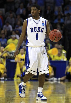 CHARLOTTE, NC - MARCH 20:  Kyrie Irving #1 of the Duke Blue Devils moves the ball while taking on the Michigan Wolverines during the third round of the 2011 NCAA men's basketball tournament at Time Warner Cable Arena on March 20, 2011 in Charlotte, North 