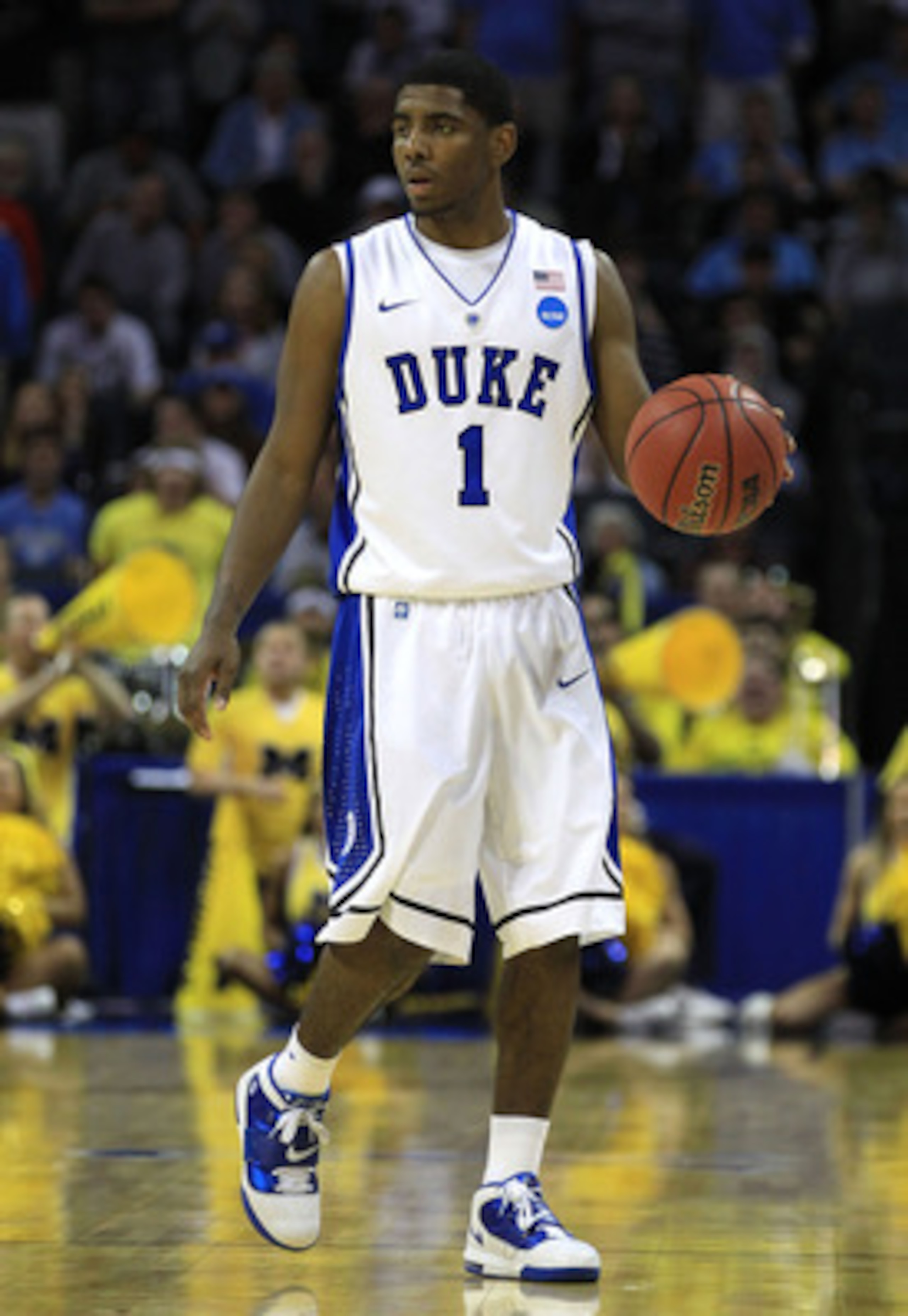 CHARLOTTE, NC - MARCH 20: Kyrie Irving #1 of the Duke Blue Devils moves the ball while taking on the Michigan Wolverines during the third round of the 2011 NCAA men's basketball tournament at Time Warner Cable Arena on March 20, 2011 in Charlotte, North CHARLOTTE, NC - MARCH 20: Kyrie Irving #1 of the Duke Blue Devils moves the ball while taking on the Michigan Wolverines during the third round of the 2011 NCAA men's basketball tournament at Time Warner Cable Arena on March 20, 2011 in Charlotte, North