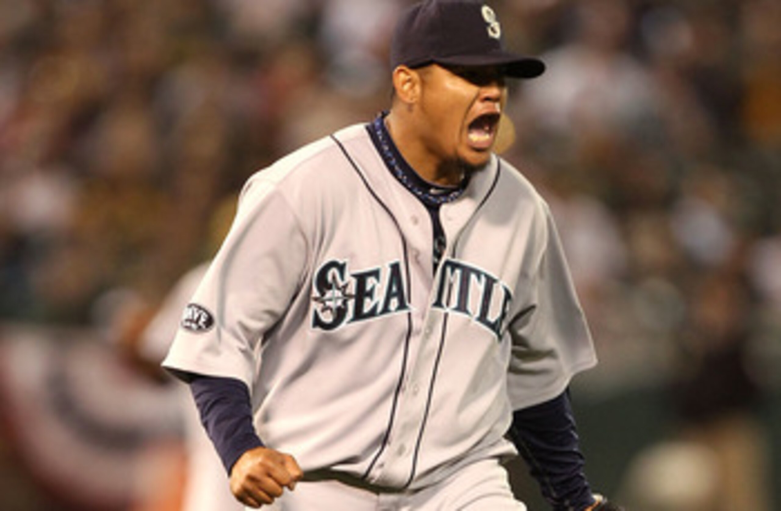 OAKLAND, CA - APRIL 01:  Felix Hernandez #34 of the Seattle Mariners celebrates at the end of the eighth inning against the Oakland Athletics during an opening day game of Major League Baseball at the Oakland-Alameda County Coliseum on April 1, 2011 in Oa