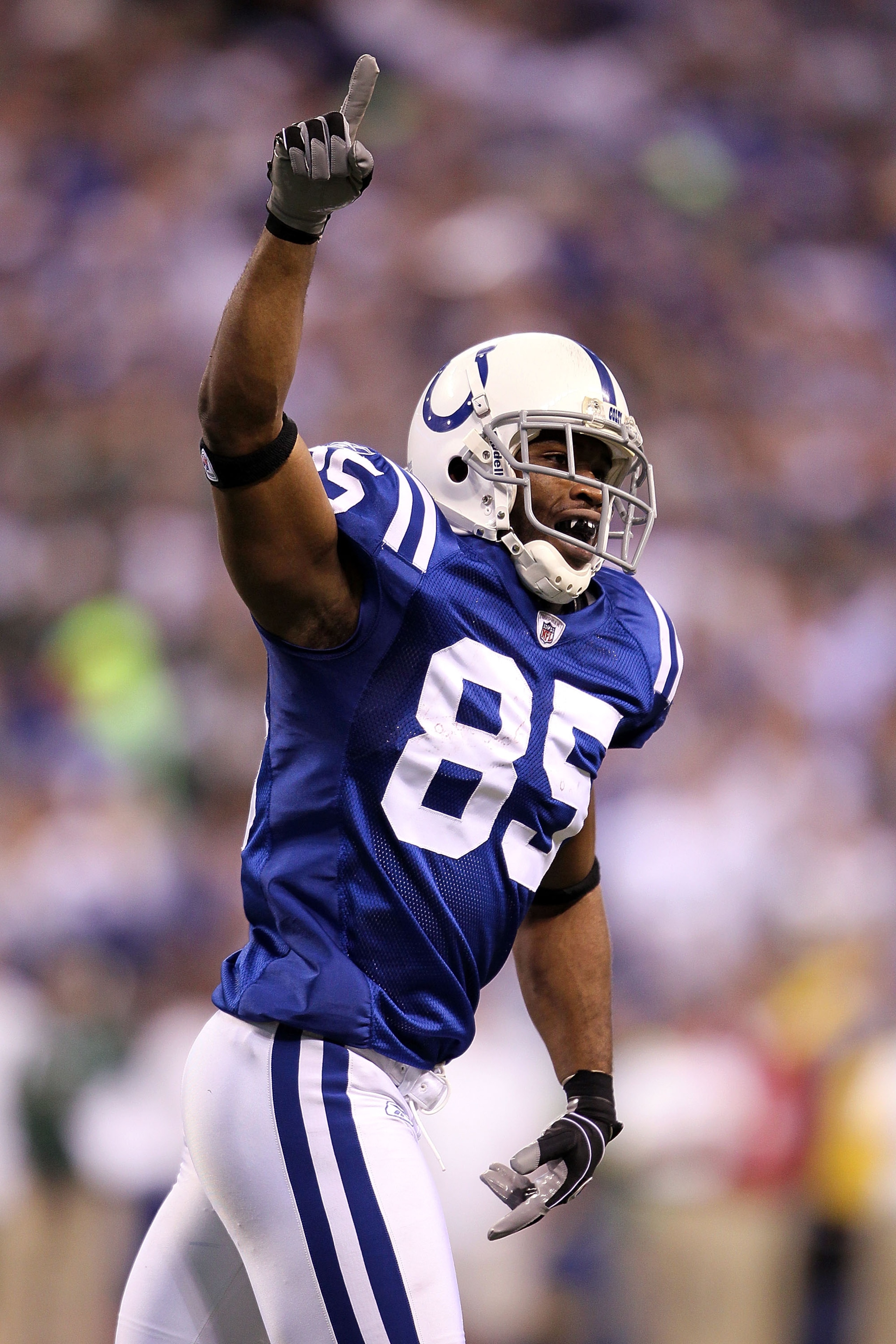 INDIANAPOLIS - JANUARY 24:  Wide receiver Pierre Garcon #85 of the Indianapolis Colts reacts after catching a four-yard touchdown in the third quarter against the New York Jets during the AFC Championship Game at Lucas Oil Stadium on January 24, 2010 in I