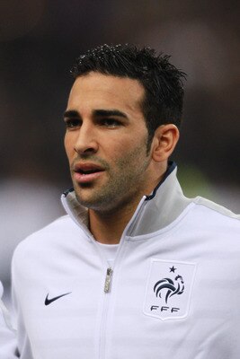 PARIS, FRANCE - MARCH 29:  Adil Rami of France sings the national anthem during the International friendly match between France and Croatia at Stade de France on March 29, 2011 in Paris, France.  (Photo by Dean Mouhtaropoulos/Getty Images)
