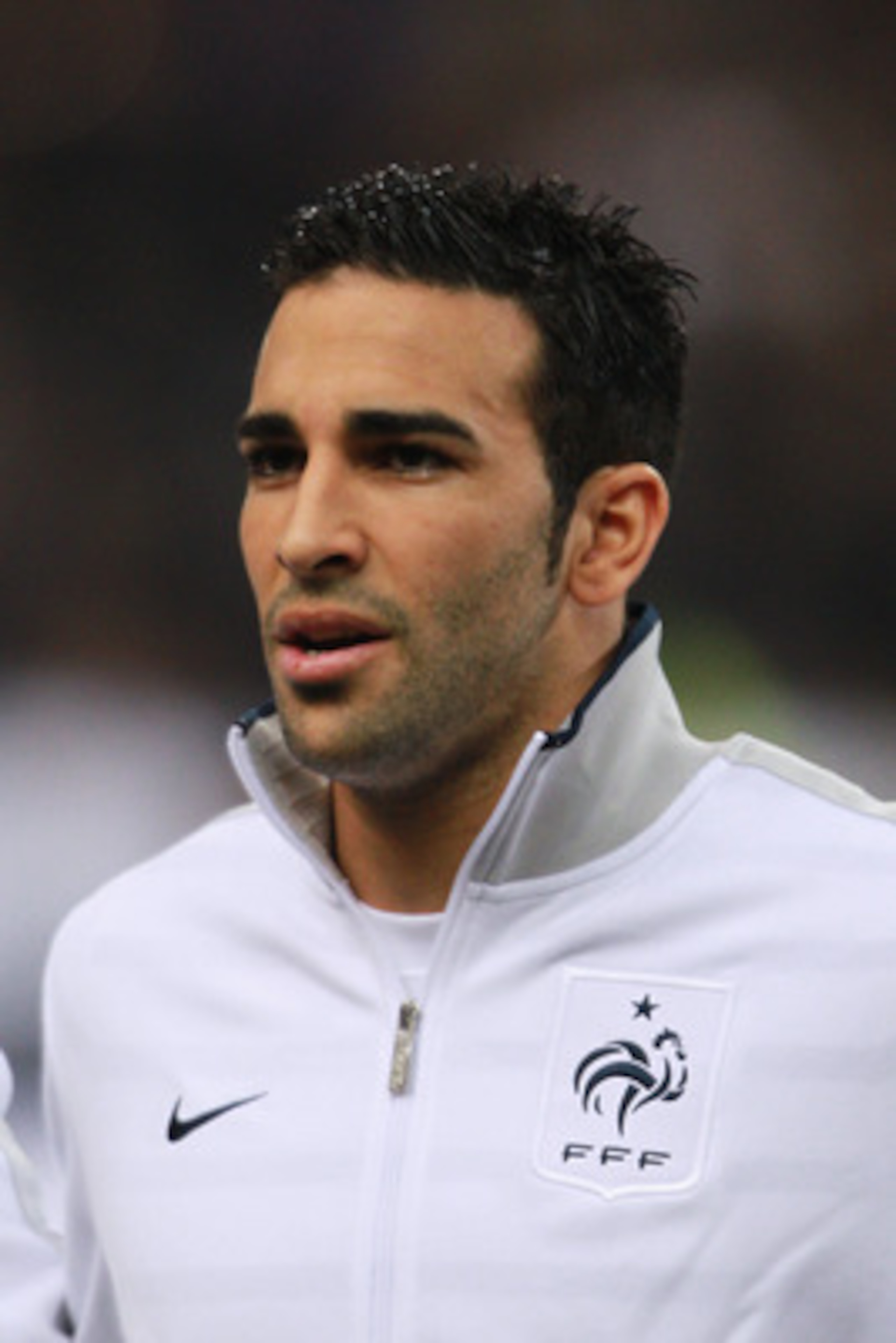 PARIS, FRANCE - MARCH 29:  Adil Rami of France sings the national anthem during the International friendly match between France and Croatia at Stade de France on March 29, 2011 in Paris, France.  (Photo by Dean Mouhtaropoulos/Getty Images)