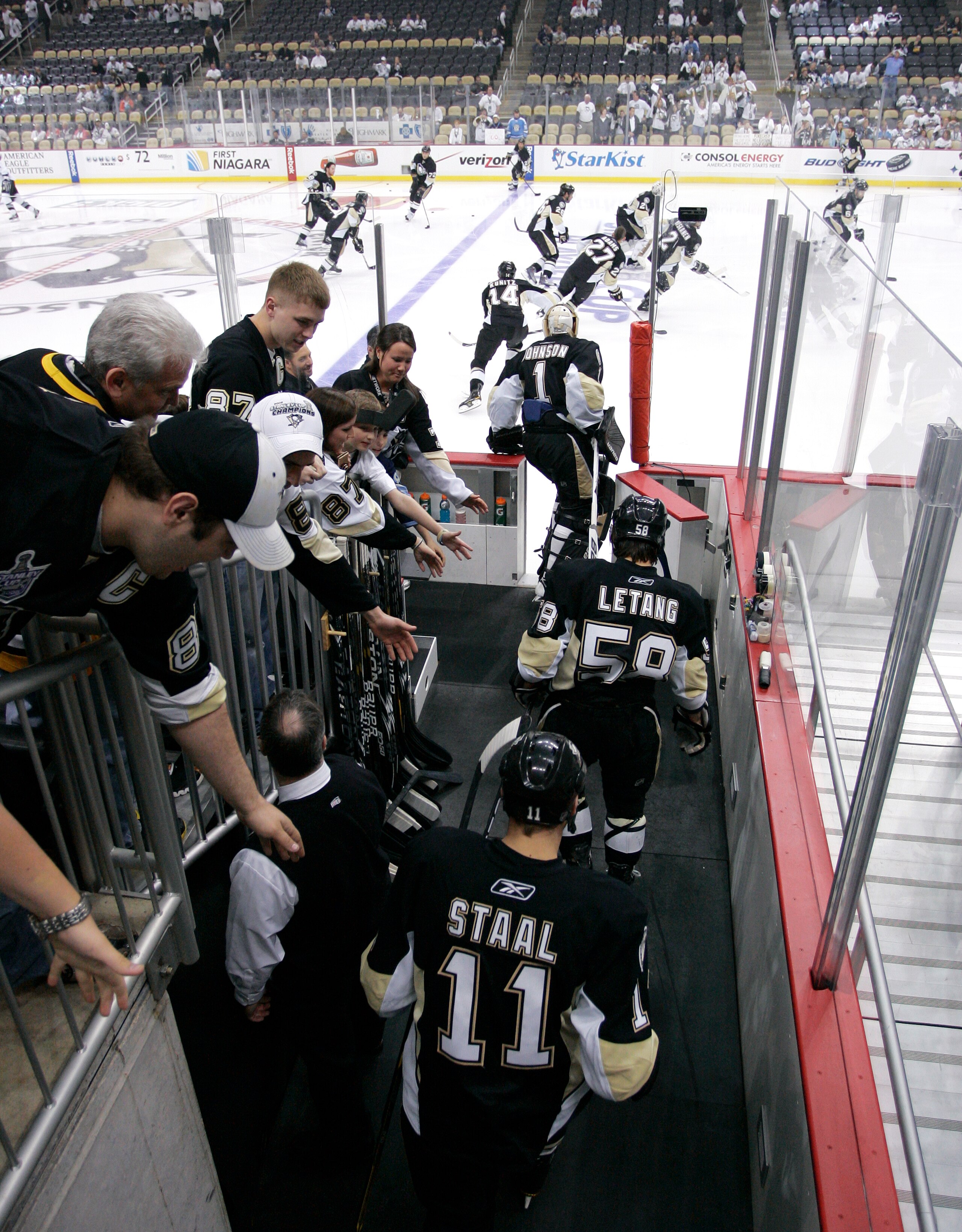 PITTSBURGH, PA - APRIL 23:  Jordan Staal #11, Kris Letang #58, and Brent Johnson #1 of the Pittsburgh Penguins take the ice for warm ups before the start of Game Five of the Eastern Conference Quarterfinals against the Tampa Bay Lightning during the 2011