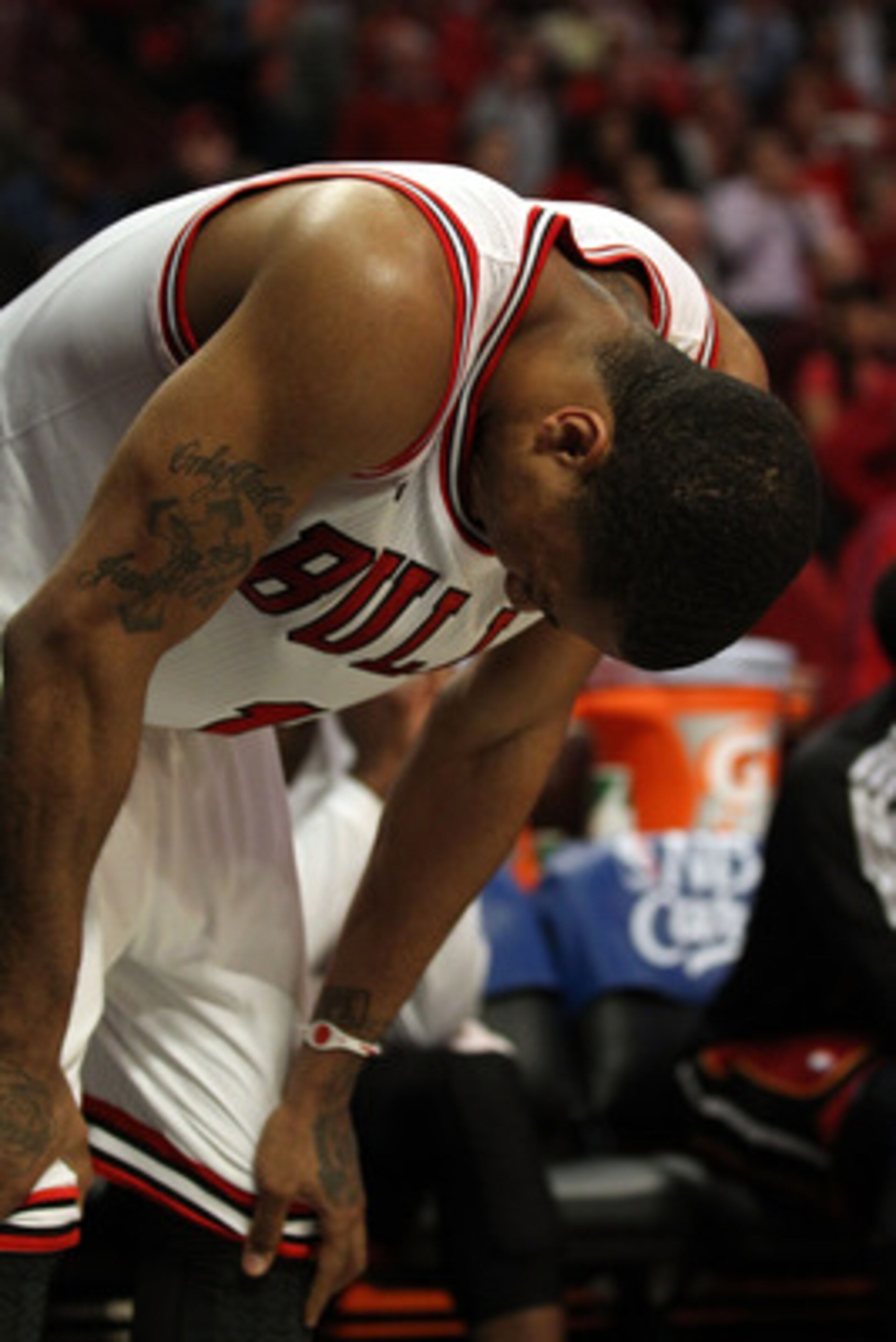CHICAGO, IL - MAY 26:  Derrick Rose #1 of the Chicago Bulls stands with his head down against the Miami Heat in Game Five of the Eastern Conference Finals during the 2011 NBA Playoffs on May 26, 2011 at the United Center in Chicago, Illinois. NOTE TO USER