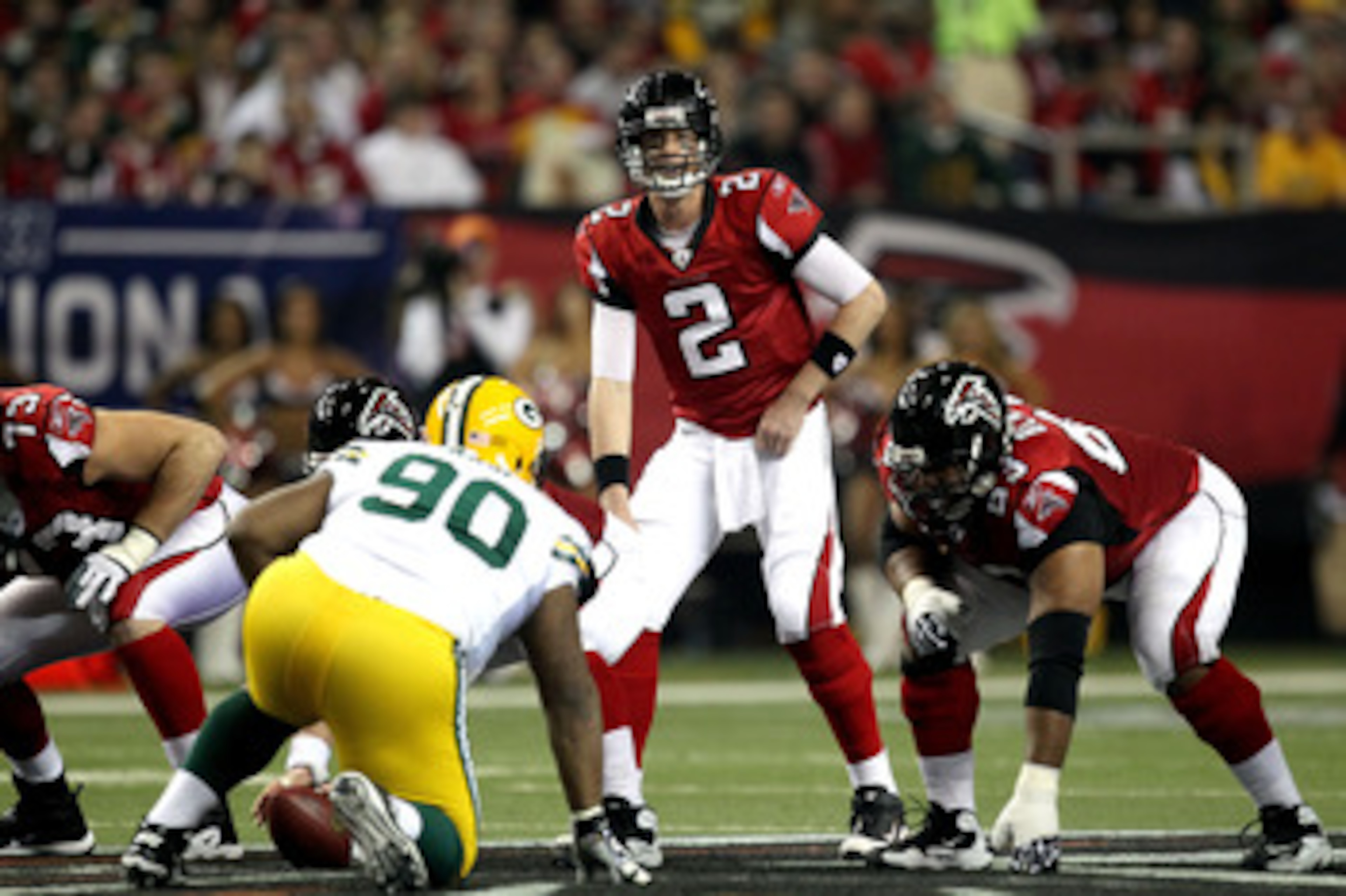 ATLANTA, GA - JANUARY 15:  Quarterback Matt Ryan #2 of the Atlanta Falcons calls signals out at the line of scrimmage against the Green Bay Packers during their 2011 NFC divisional playoff game at Georgia Dome on January 15, 2011 in Atlanta, Georgia.  (Ph