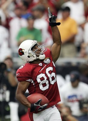 PHOENIX - SEPTEMBER 10:  Troy Walters #86 of the Arizona Cardinals celebrates his touchdown against the San Francisco 49ers during the first quarter in the season opening game at Cardinals Stadium on September 10, 2006 in Phoenix, Arizona.  (Photo by Harr