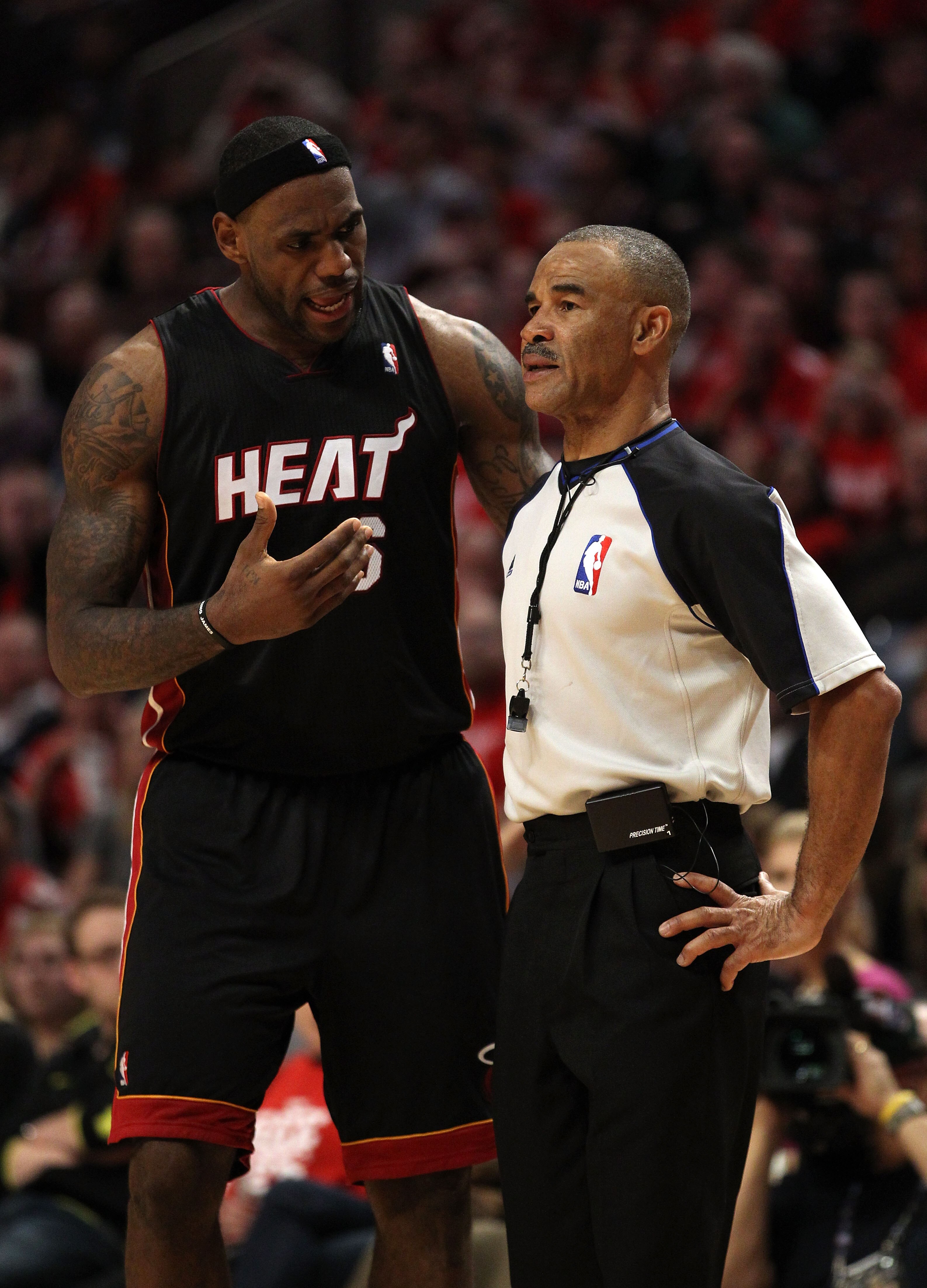 CHICAGO, IL - MAY 15:  LeBron James #6 of the Miami Heat talks with referee Danny Crawford against the Chicago Bulls in Game One of the Eastern Conference Finals during the 2011 NBA Playoffs on May 15, 2011 at the United Center in Chicago, Illinois. The B