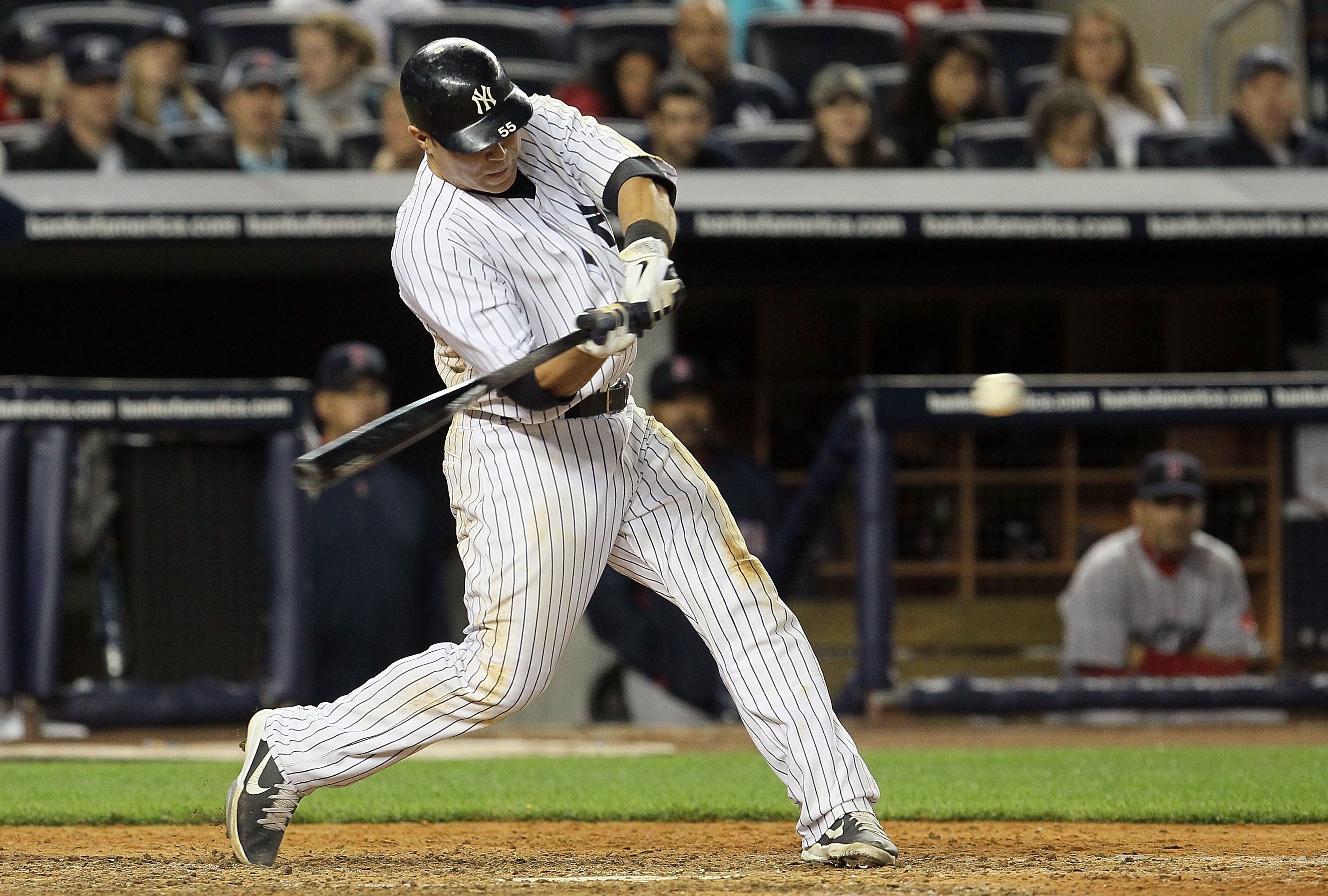 NEW YORK, NY - MAY 14:  Russell Martin #55 of the New York Yankees bats against the Boston Red Sox on May 14, 2011 at Yankee Stadium in the Bronx borough of New York City.  (Photo by Jim McIsaac/Getty Images)