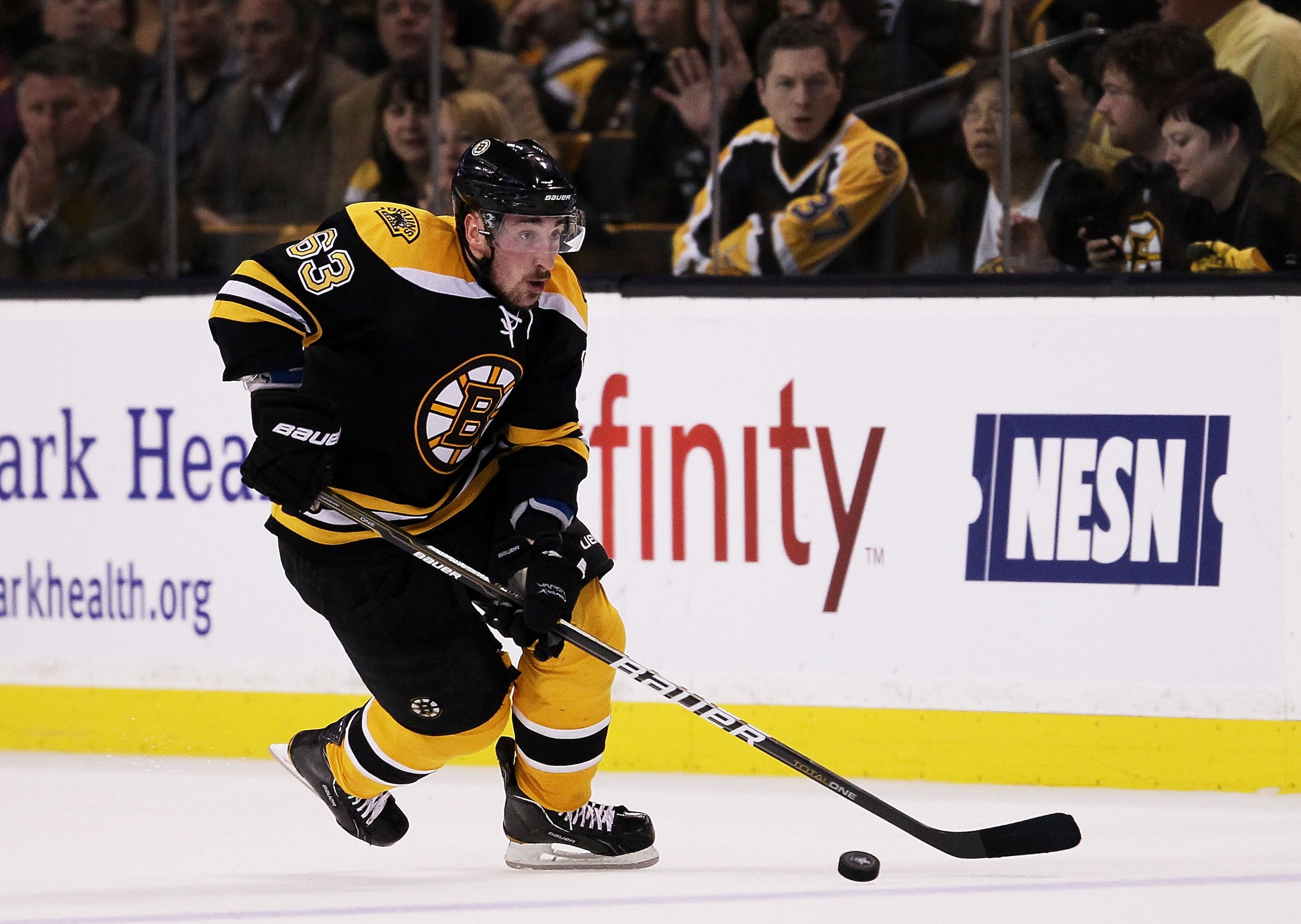 BOSTON, MA - MAY 23:  Brad Marchand #63 of the Boston Bruins controls the puck in Game Five of the Eastern Conference Finals against the Tampa Bay Lightning during the 2011 NHL Stanley Cup Playoffs at TD Garden on May 23, 2011 in Boston, Massachusetts.  (