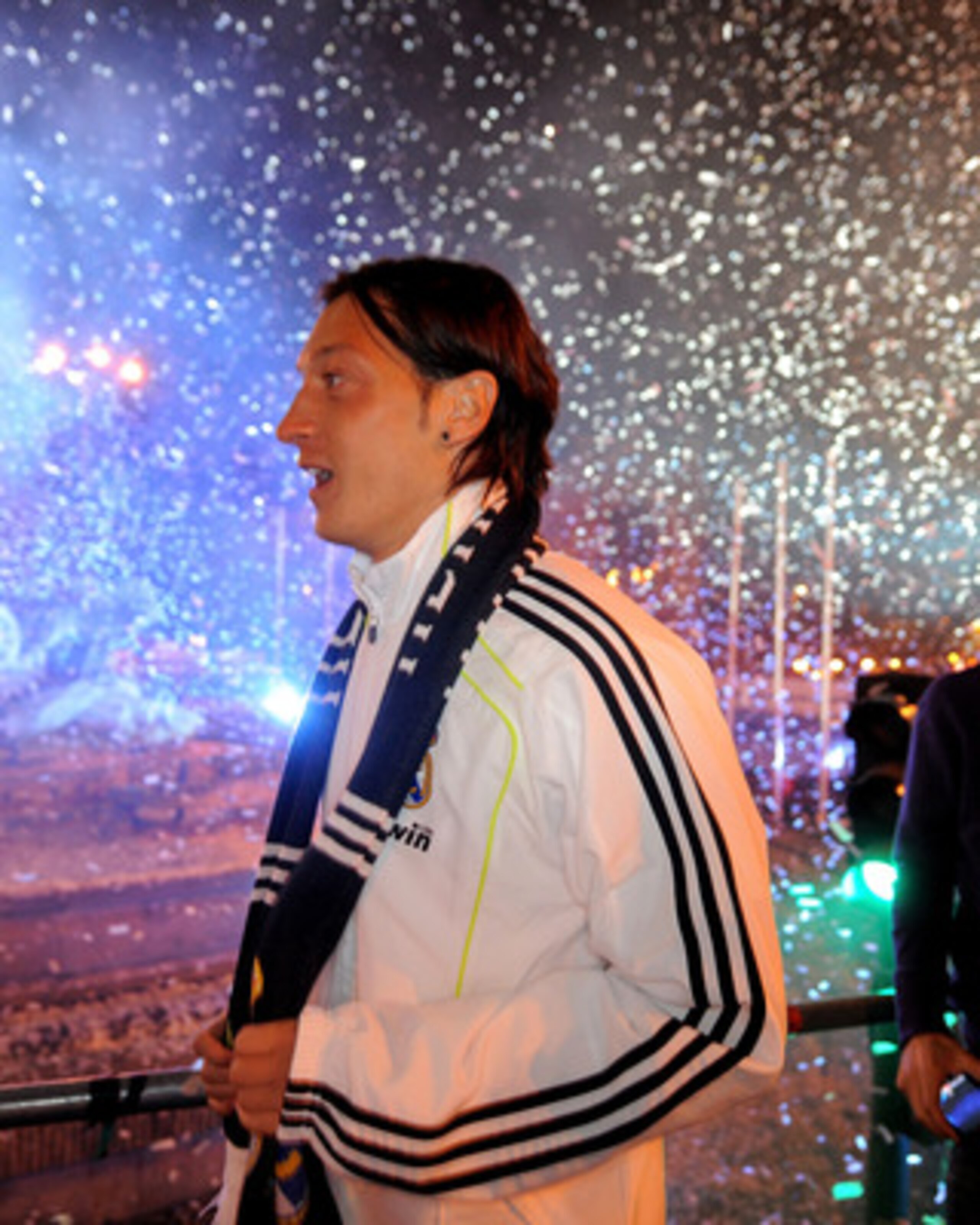 MADRID, SPAIN - APRIL 21:  Mesut Ozil of Real Madrid takes part in celebrations at Plaza Cibeles on April 21, 2011 in Madrid, Spain. Real beat Barcelona 1-0 in the Copa del Rey final in Valencia's Mestalla stadium on April 20.  (Photo by Denis Doyle/Getty