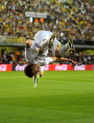 VILLARREAL, SPAIN - MAY 15:  Marcelo of Real Madrid celebrates after scoring Real's first goal during the La Liga match between Villarreal and Real Madrid at estadio El Madrigal on May 15, 2011 in Villarreal, Spain.  (Photo by Denis Doyle/Getty Images)