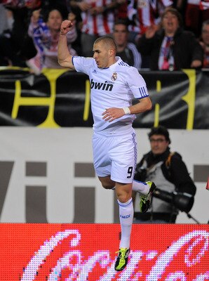 MADRID, SPAIN - MARCH 19:  Karim Benzema of Real Madrid celebrates after scoring the opening goal  during the La Liga match between Atletico Madrid and Real Madrid at Vicente Calderon Stadium on March 19, 2011 in Madrid, Spain.  (Photo by Denis Doyle/Gett