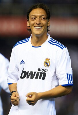 VALENCIA, BARCELONA - APRIL 20: Mesut Ozil of Real Madrid celebrates after the Copa del Rey final match between Real Madrid and Barcelona at Estadio Mestalla on April 20, 2011 in Valencia, Spain.  (Photo by Manuel Queimadelos Alonso/Getty Images)