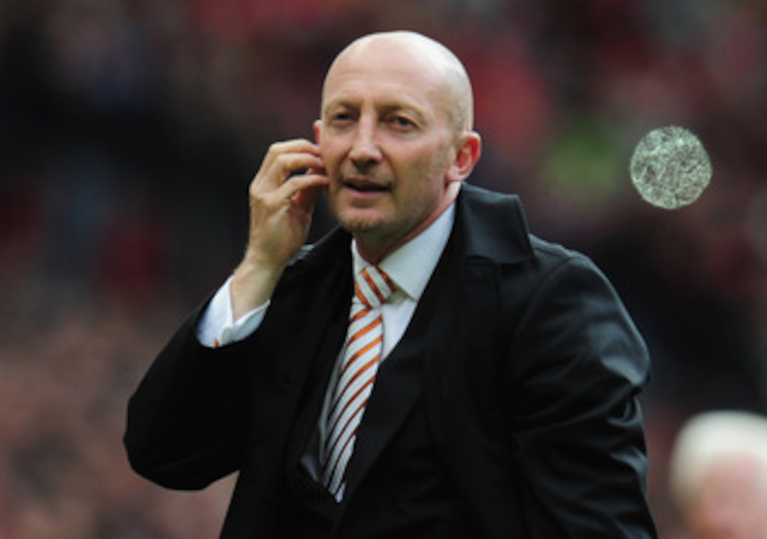 MANCHESTER, ENGLAND - MAY 22: A dejected Ian Holloway manager of Blackpool looks on as Blackpool are relegated after the Barclays Premier League match between Manchester United and Blackpool at Old Trafford on May 22, 2011 in Manchester, England. (Photo MANCHESTER, ENGLAND - MAY 22: A dejected Ian Holloway manager of Blackpool looks on as Blackpool are relegated after the Barclays Premier League match between Manchester United and Blackpool at Old Trafford on May 22, 2011 in Manchester, England. (Photo