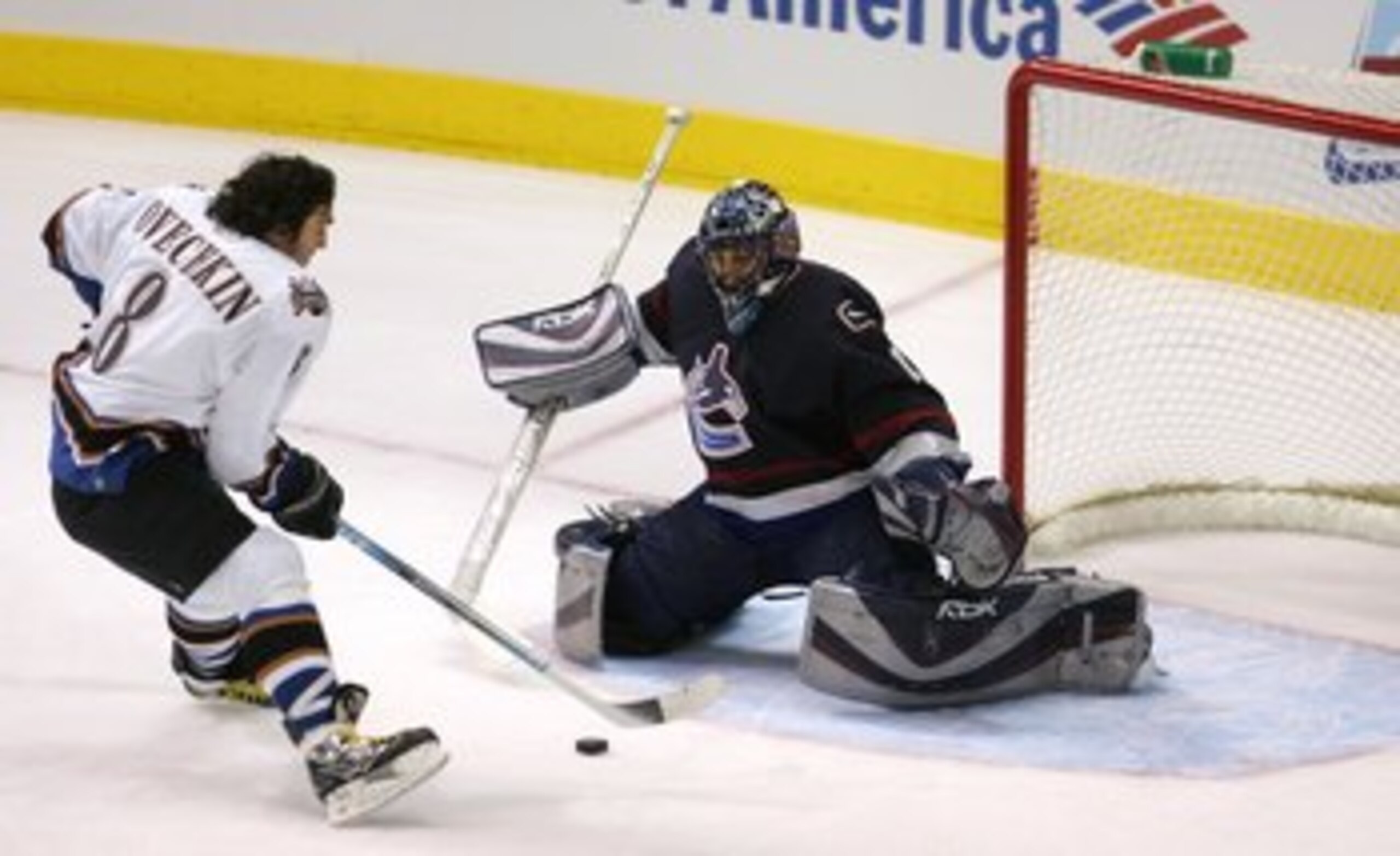 DALLAS - JANUARY 23:  Eastern Conference All-Star Alex Ovechkin #8 of the Washington Capitals scores a goal against Western Conference All-Star goaltender Roberto Luongo #1 of the Vancouver Canucks during the 'Shootout' in the 2007 NHL All-Star Skills Gam
