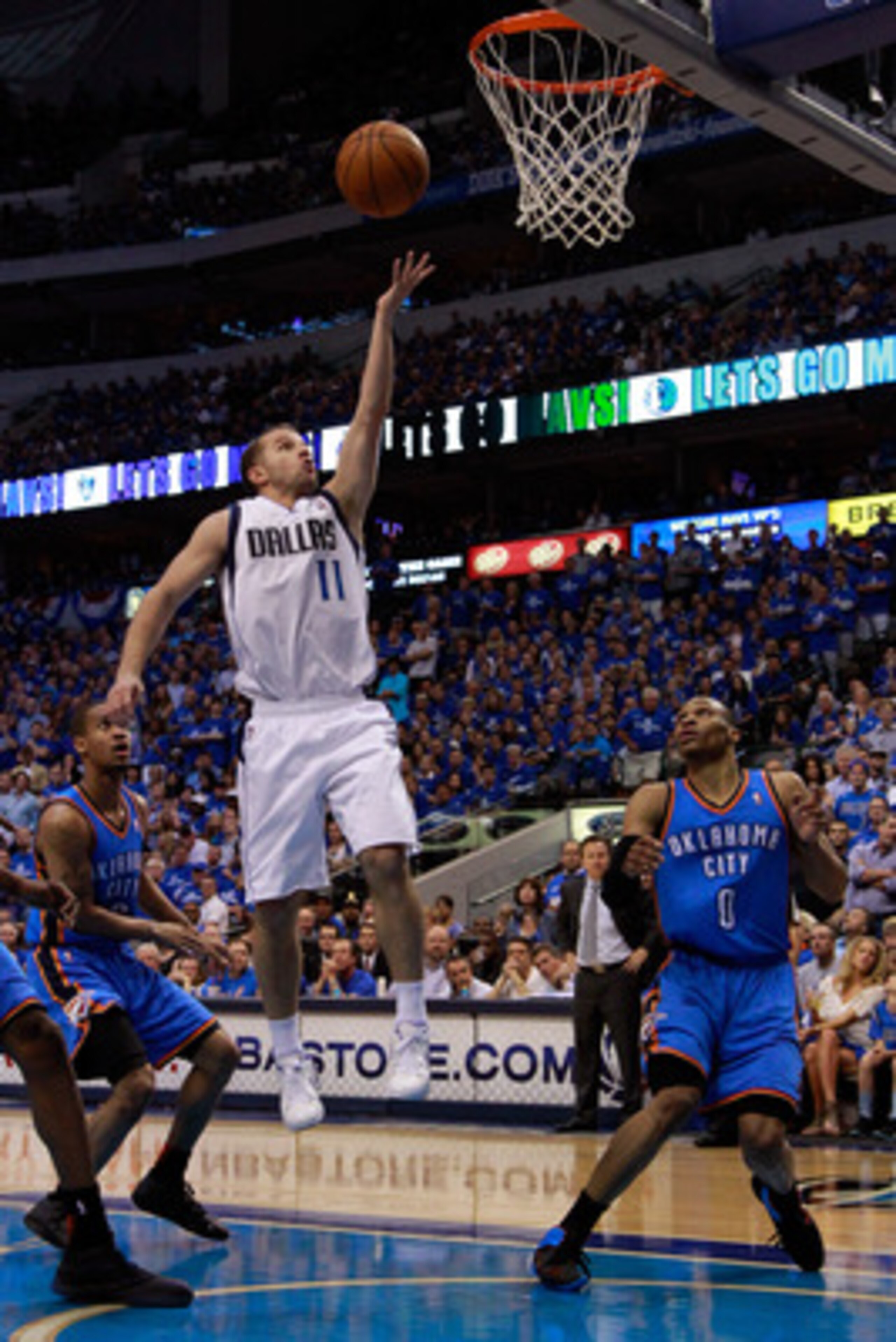 DALLAS, TX - MAY 25: Jose Juan Barea #11 of the Dallas Mavericks goes up for a shot over Russell Westbrook #0 of the Oklahoma City Thunder in the second half in Game Five of the Western Conference Finals during the 2011 NBA Playoffs at American Airlines DALLAS, TX - MAY 25: Jose Juan Barea #11 of the Dallas Mavericks goes up for a shot over Russell Westbrook #0 of the Oklahoma City Thunder in the second half in Game Five of the Western Conference Finals during the 2011 NBA Playoffs at American Airlines