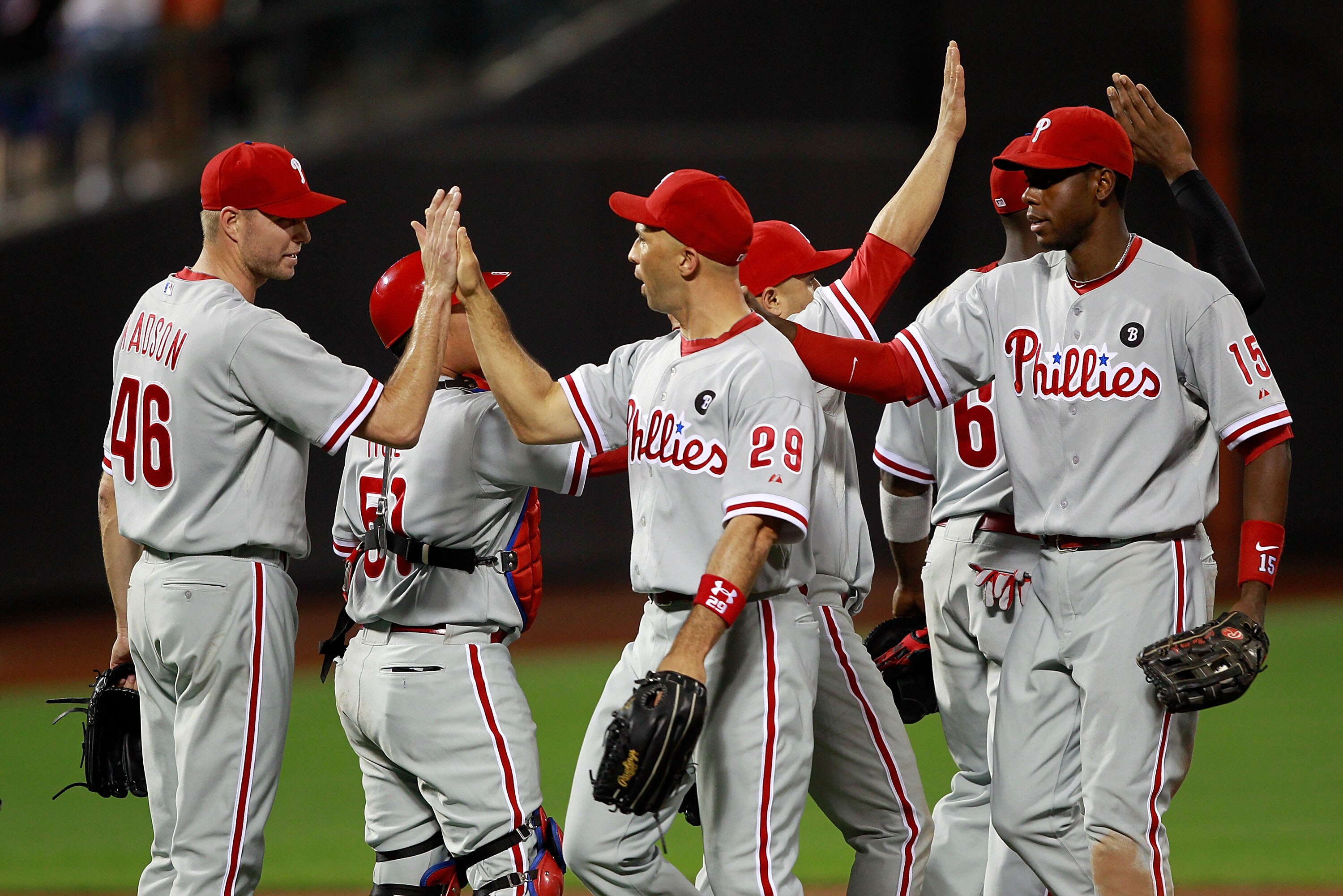 NEW YORK, NY - MAY 28:  Ryan Madson #46 of the Philadelphia Phillies is congratulated by his teammates following his saved game against the  New York Mets at Citi Field on May 28, 2011 in the Flushing neighborhood of the Queens borough of New York City. T