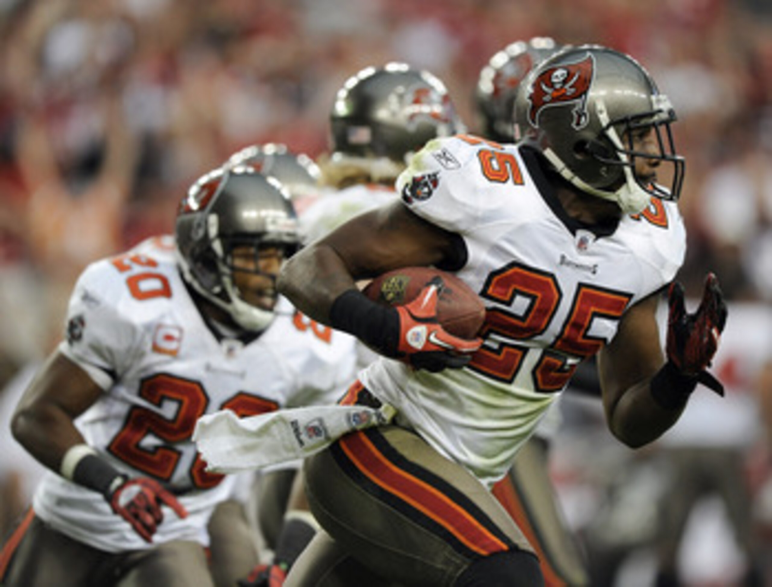GLENDALE, AZ - OCTOBER 31:  Aqib Talib #25 of the Tampa Bay Buccaneers reacts to his interception against the Arizona Cardinals during the fourth quarter at University of Phoenix Stadium on October 31, 2010 in Glendale, Arizona.  (Photo by Harry How/Getty
