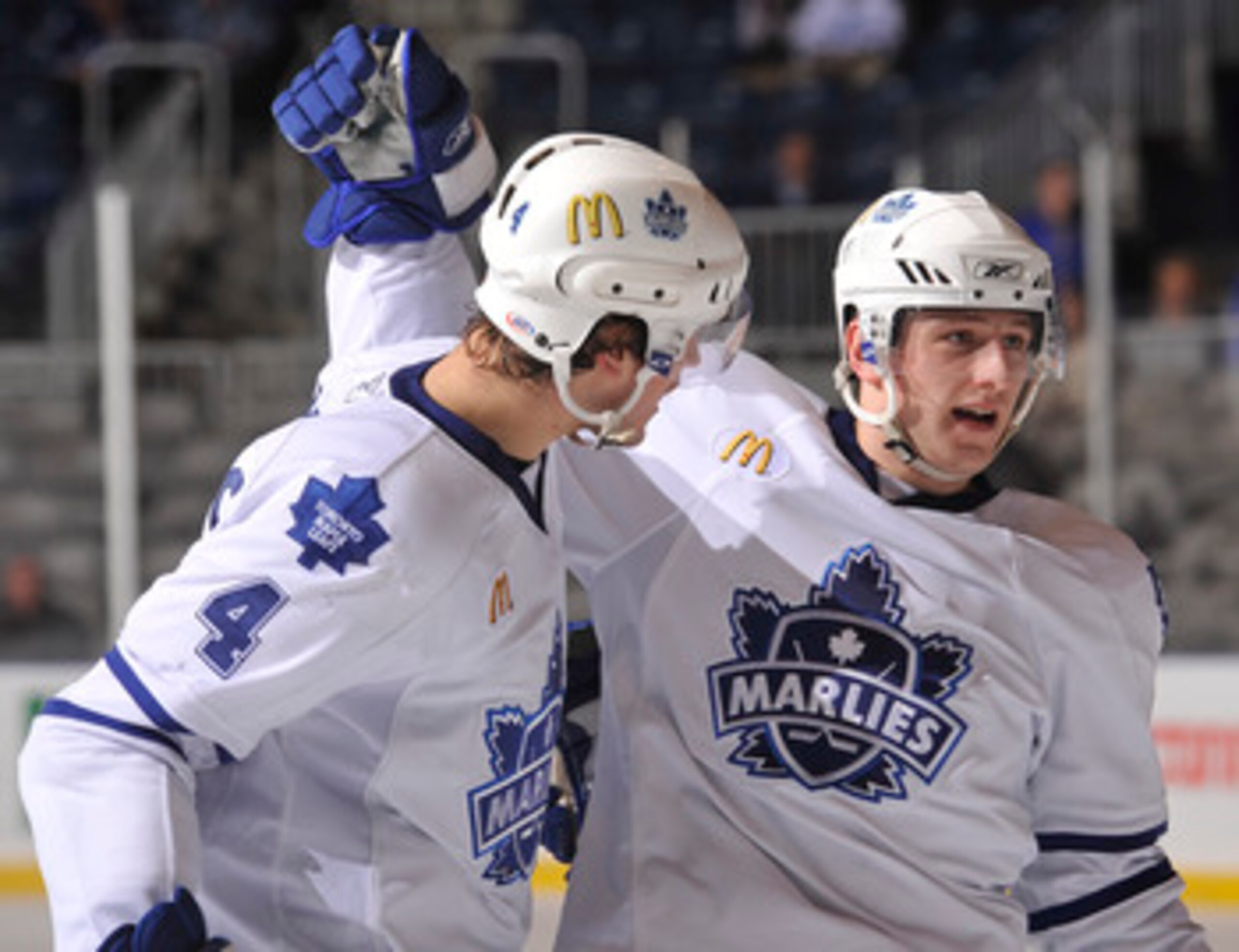 TORONTO - APRIL 16: Jiri Tlusty #41 of the Toronto Marlies celebrates his game winning goal against the San Antonio Rampage with team mate Phil Oreskovic #4 on April 16, 2007 at the Ricoh Coliseum in Toronto, Ontario, Canada. (Photo by Brad White / Getty TORONTO - APRIL 16: Jiri Tlusty #41 of the Toronto Marlies celebrates his game winning goal against the San Antonio Rampage with team mate Phil Oreskovic #4 on April 16, 2007 at the Ricoh Coliseum in Toronto, Ontario, Canada. (Photo by Brad White / Getty