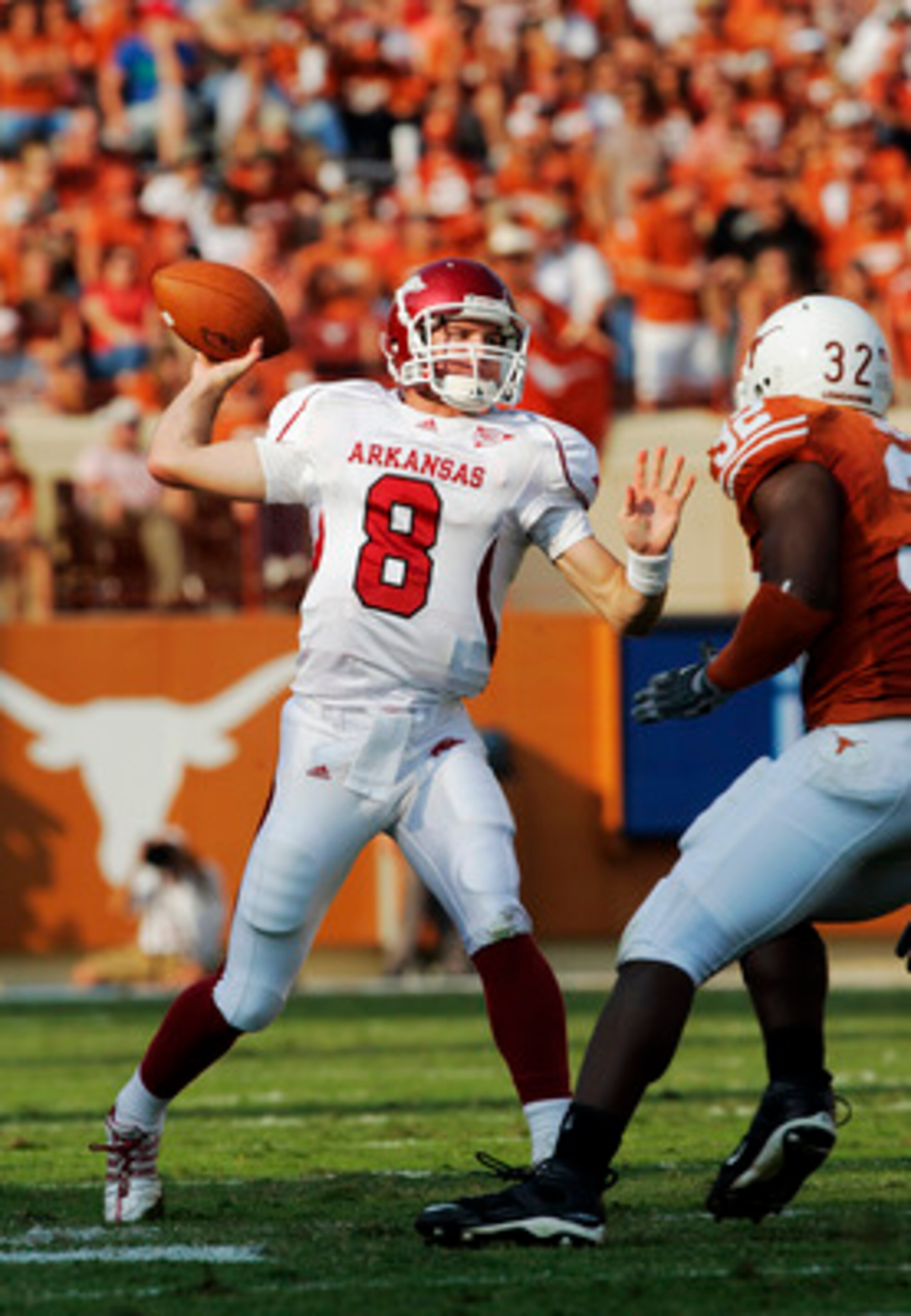 AUSTIN, TX - SEPTEMBER 27: Quarterback Tyler Wilson #8 of the Arkansas Razorbacks throws against Texas Longhorns in the fourth quarter on September 27, 2008 at Darrell K Royal-Texas Memorial Stadium in Austin, Texas.  Texas won 52-10. (Photo by Brian Bahr