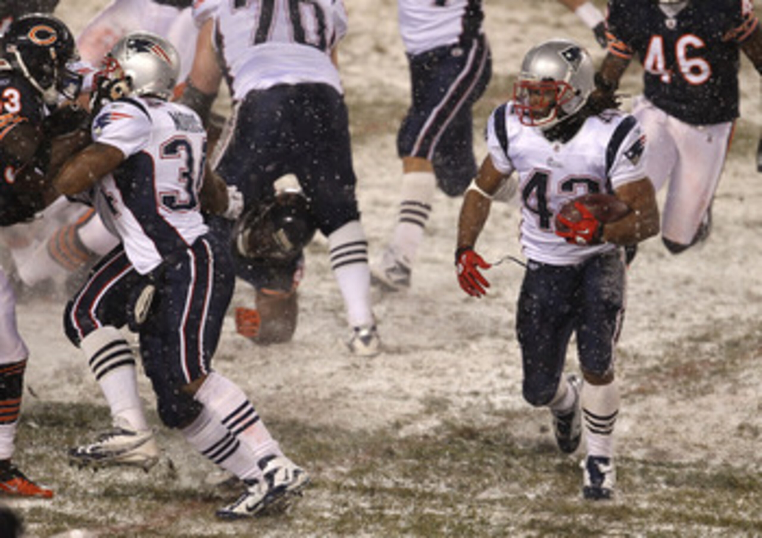 CHICAGO, IL - DECEMBER 12: Ben-Jarvus Green-Ellis #42 of the New England Patriots looks for running room against the Chicago Bears at Soldier Field on December 12, 2010 in Chicago, Illinois. The Patriots defeated the Bears 36-7. (Photo by Jonathan Daniel/