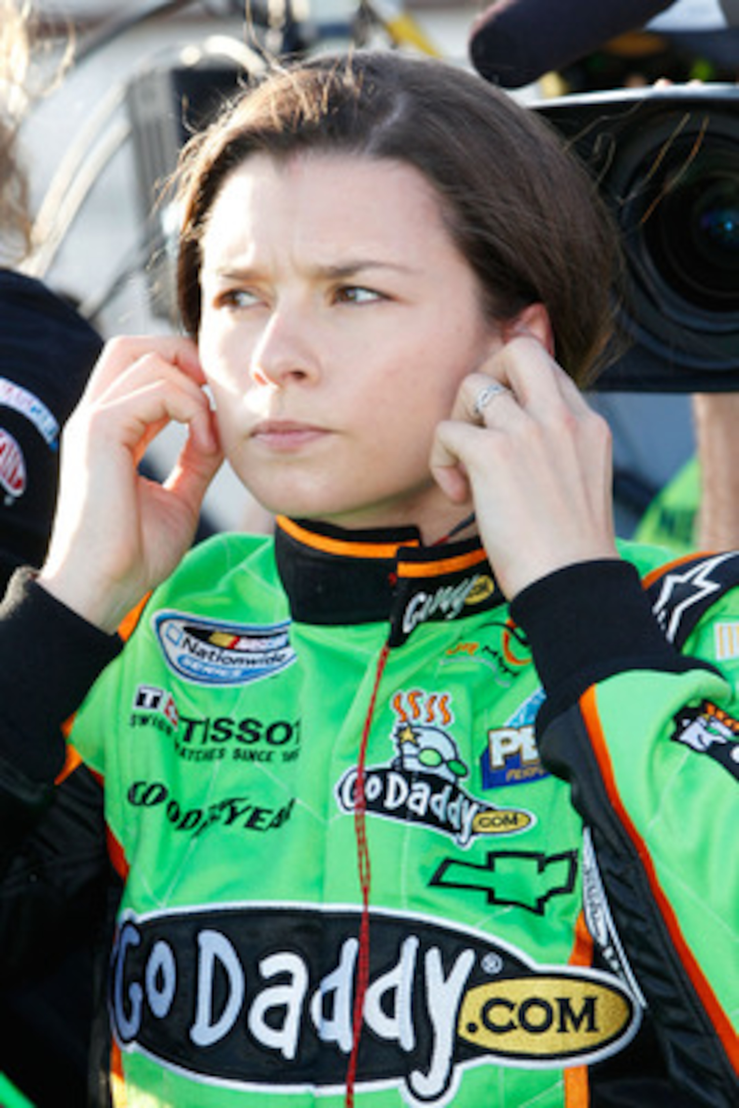 DAYTONA BEACH, FL - FEBRUARY 18:  Danica Patrick, driver of the #7 GoDaddy.com Chevrolet, looks on during qualifying for the NASCAR Nationwide Series DRIVE4COPD 300 at Daytona International Speedway on February 18, 2011 in Daytona Beach, Florida.  (Photo
