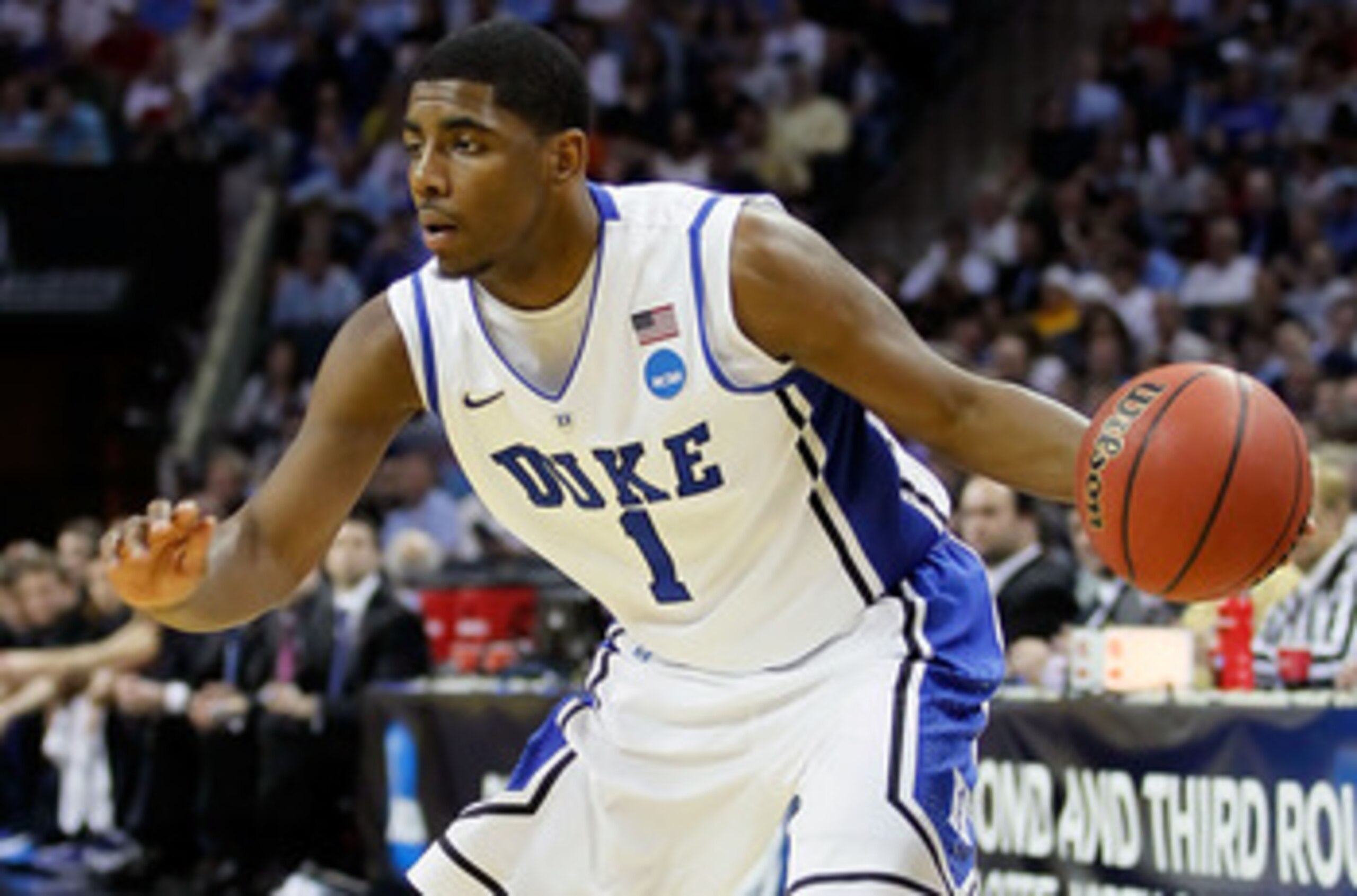 CHARLOTTE, NC - MARCH 20:  Kyrie Irving #1 of the Duke Blue Devils moves the ball while taking on the Michigan Wolverines during the third round of the 2011 NCAA men's basketball tournament at Time Warner Cable Arena on March 20, 2011 in Charlotte, North